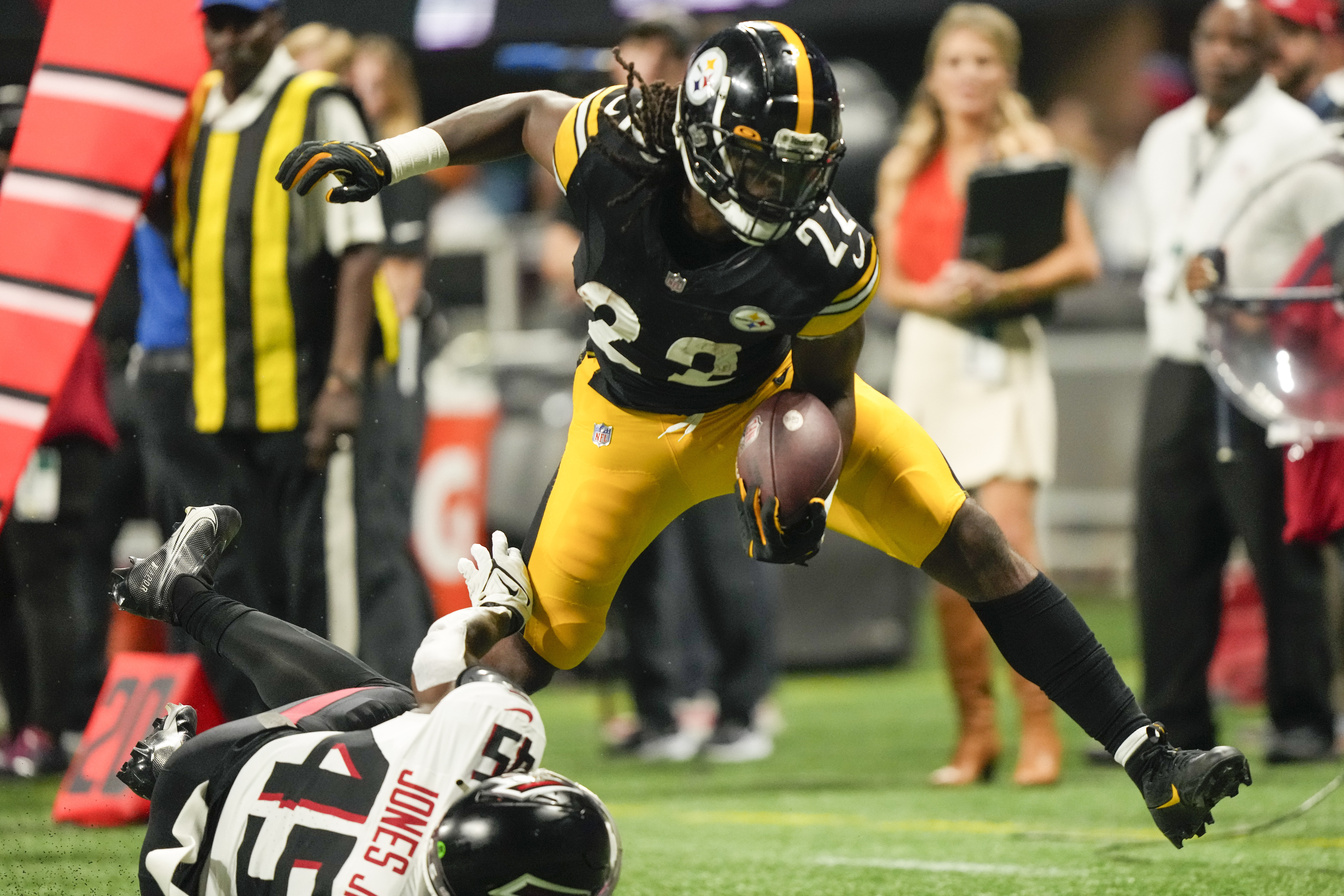 FILE - Pittsburgh Steelers linebacker T.J. Watt tackles Atlanta Falcons  quarterback Taylor Heinicke during the first half of a preseason NFL  football game Thursday, Aug. 24, 2023, in Atlanta. Watt has established