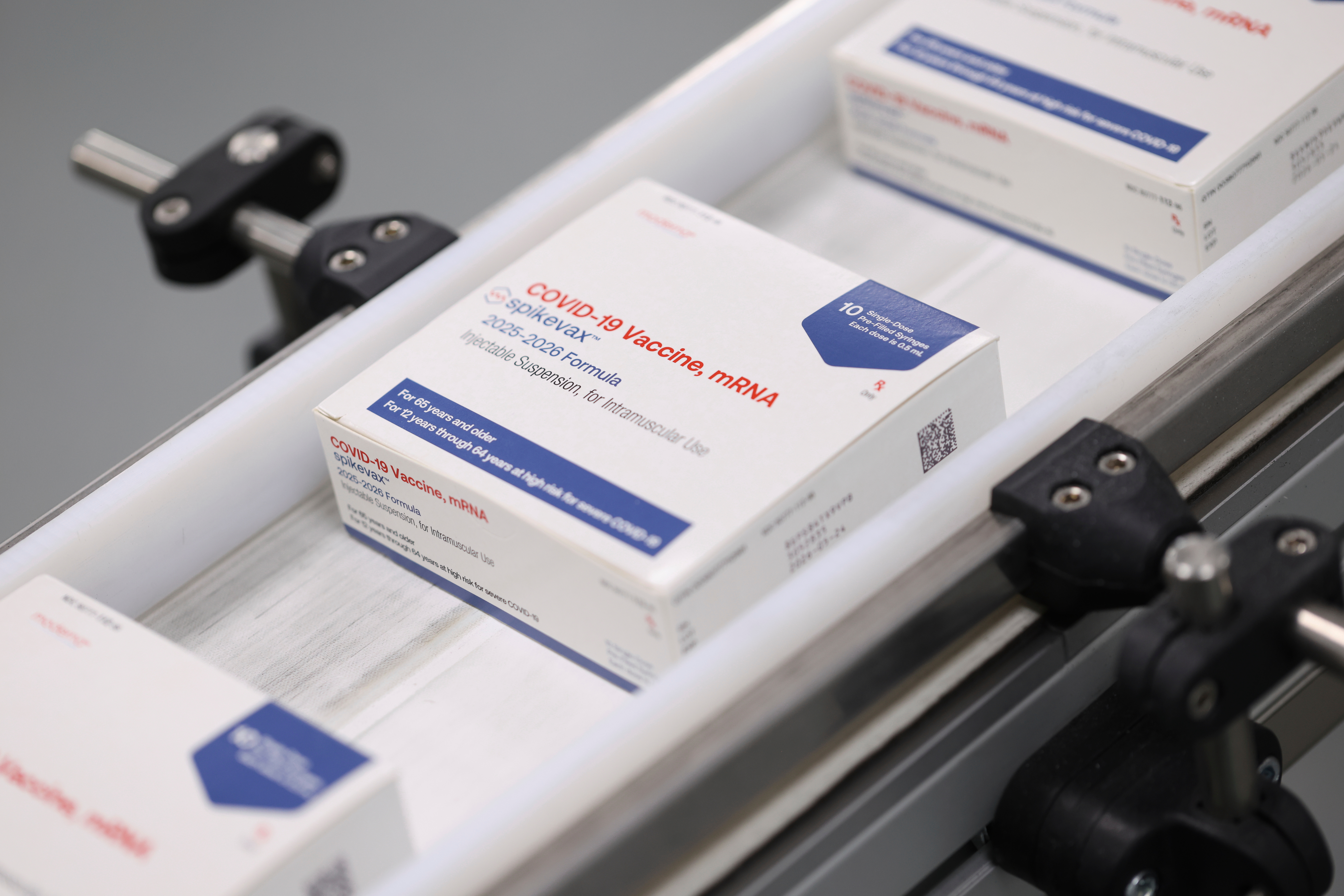 FDA approves updated COVID-19 shots with limits for some kids and
