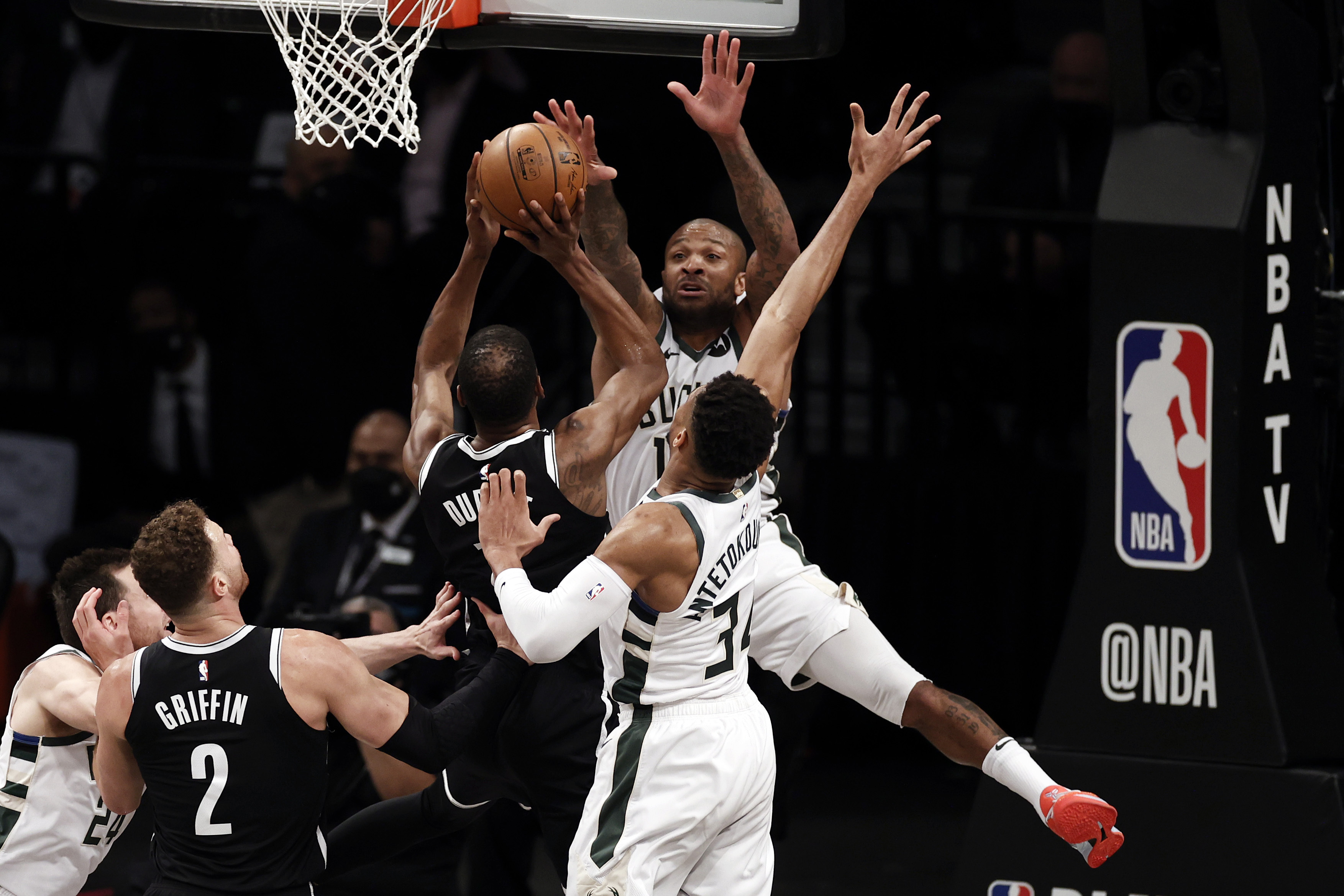 Kyrie Irving injured as Giannis Antetokounmpo, Bucks even series vs. Nets -  The Boston Globe