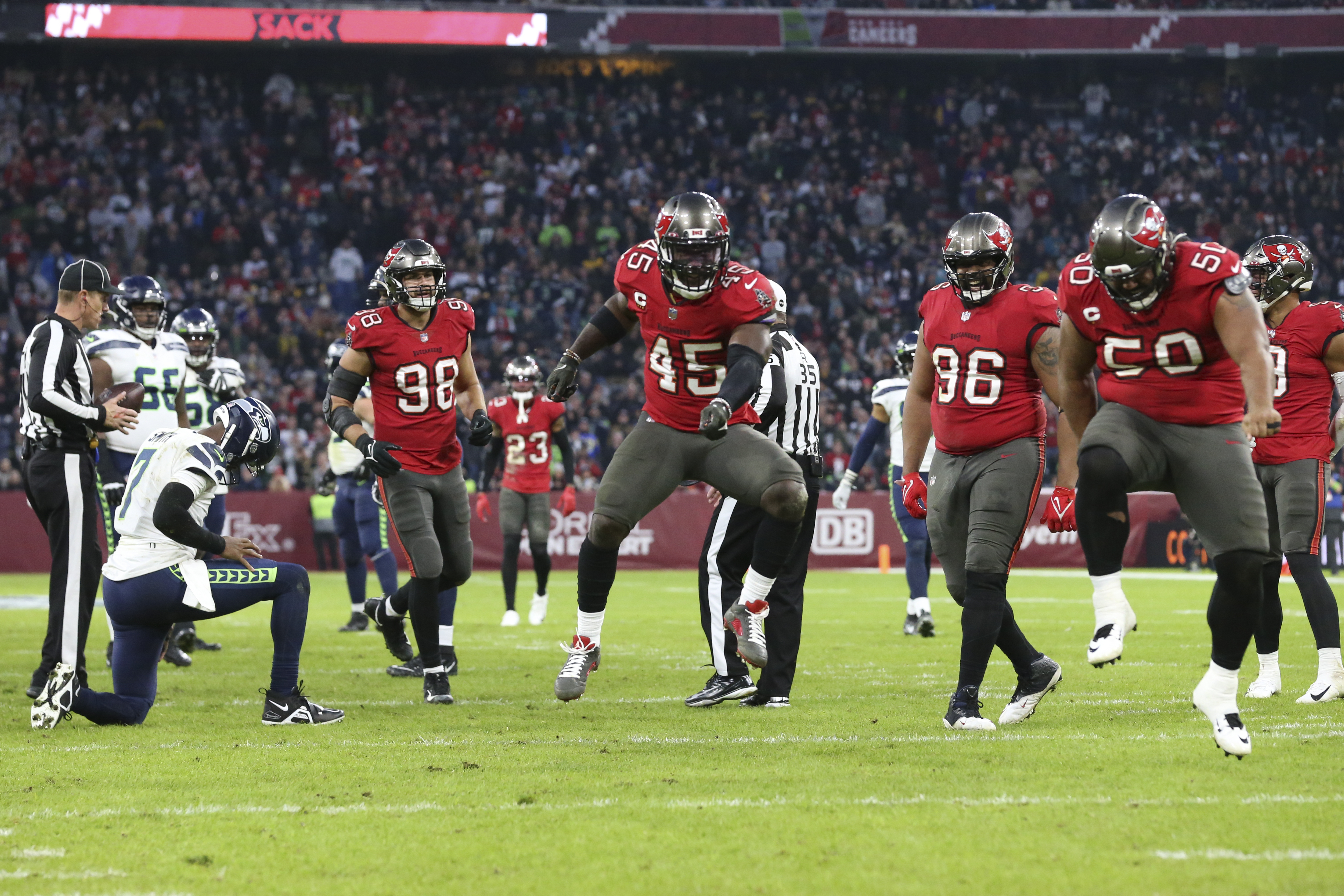 Fans queue up outside the NFL Shop before an NFL football game between the  Tampa Bay Buccaneers and the Seattle Seahawks at Allianz Arena in Munich,  Germany, Sunday, Nov. 13, 2022. (AP