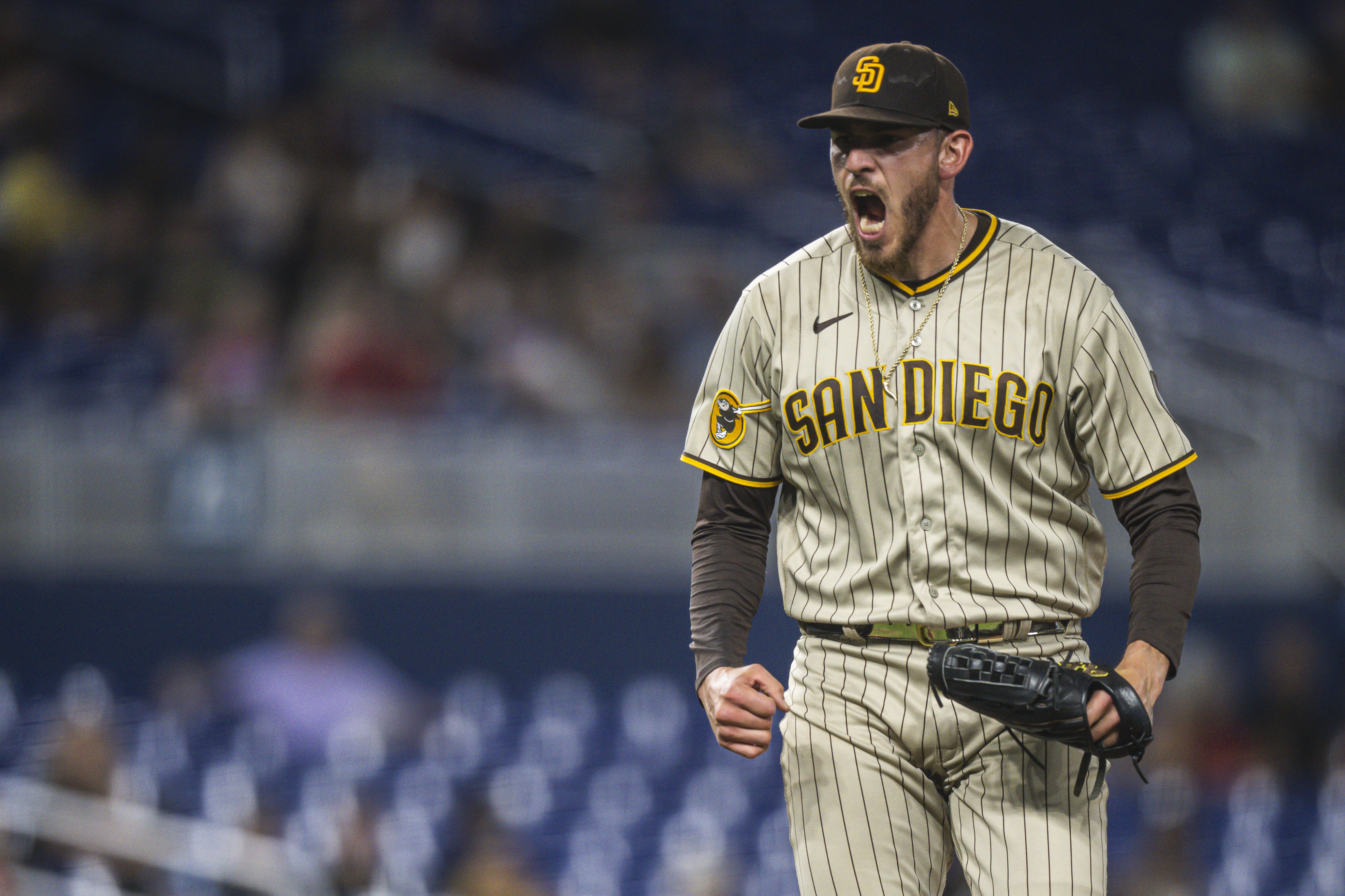 Padres rally past Marlins with five in ninth