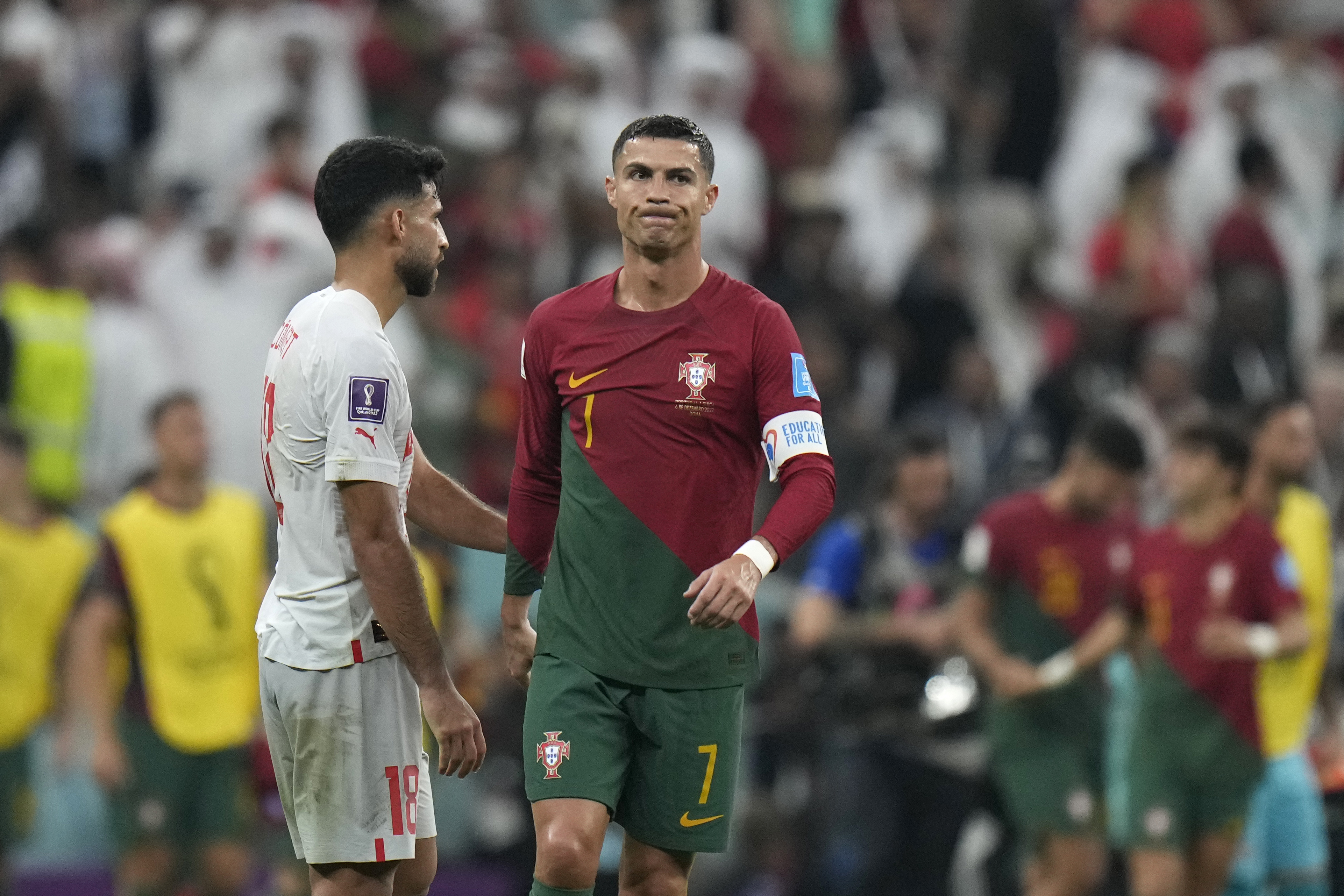 Voice of America - Cristiano Ronaldo of Portugal, left, and Lionel