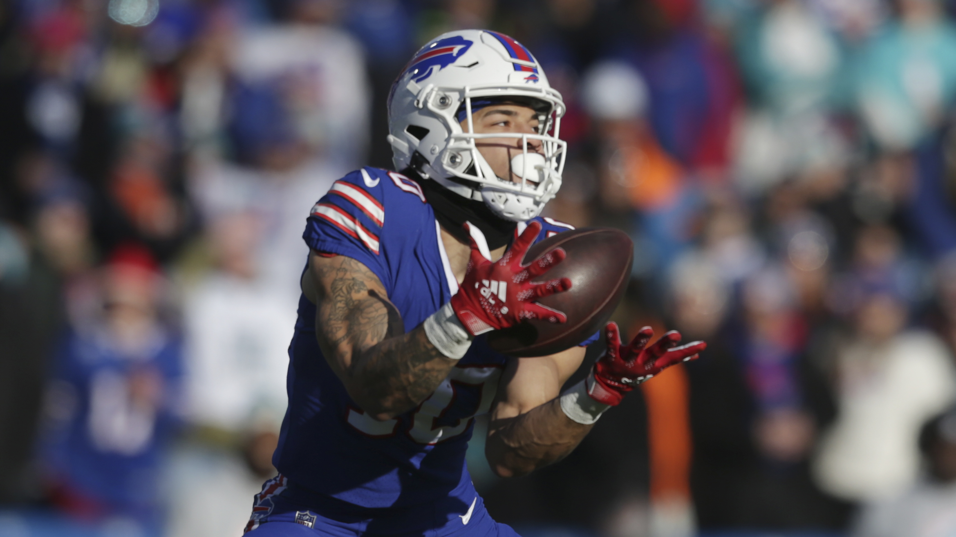 Buffalo Bills wide receiver Gabe Davis (13) catches a pass and runs against  the New York Jets in an NFL football game, Sunday, Dec. 11, 2022, in  Orchard Park, N.Y. Bills won