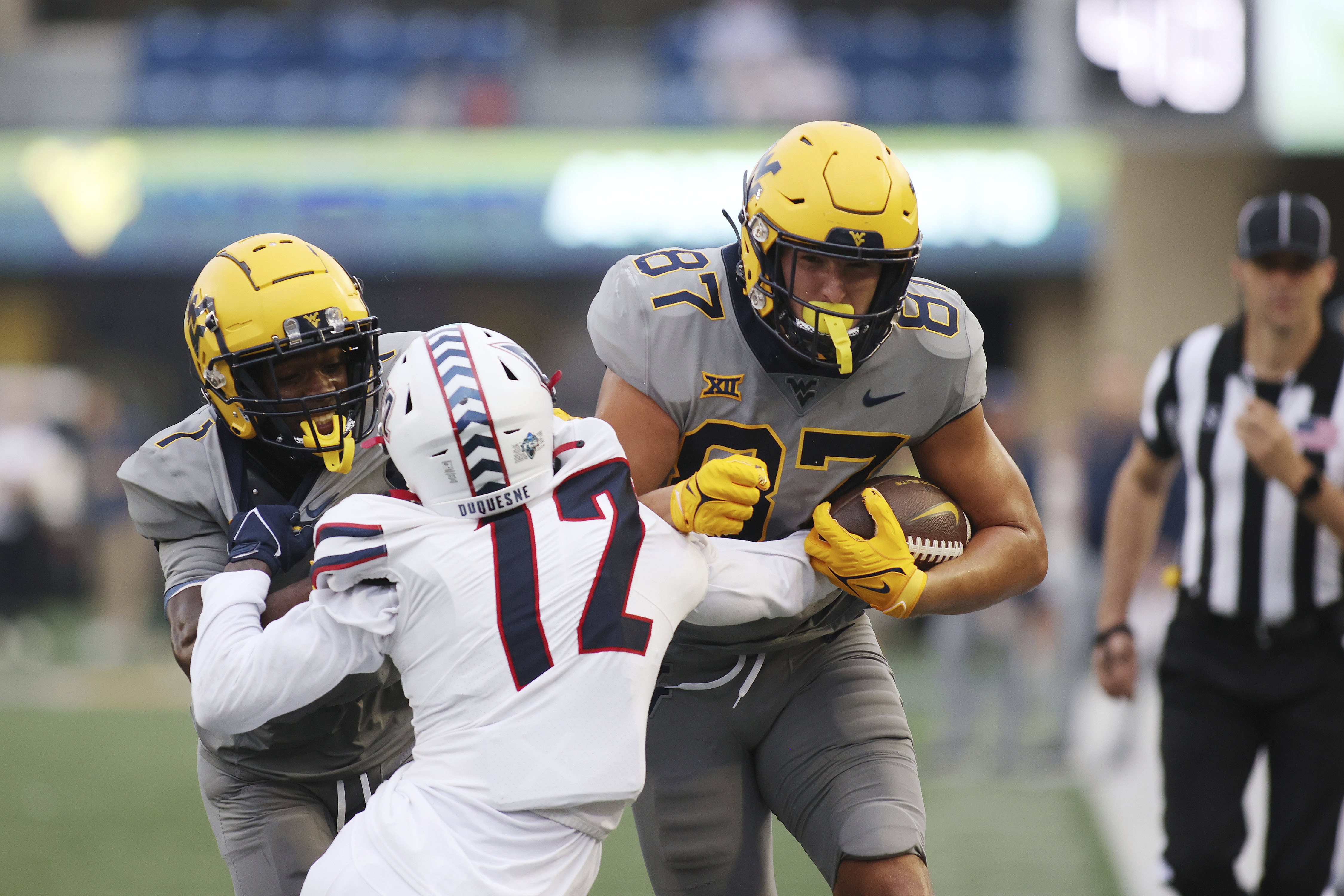 Hudson Clement has 177 receiving yards, 3 TDs in college debut, West  Virginia beats Duquesne 56-17, National