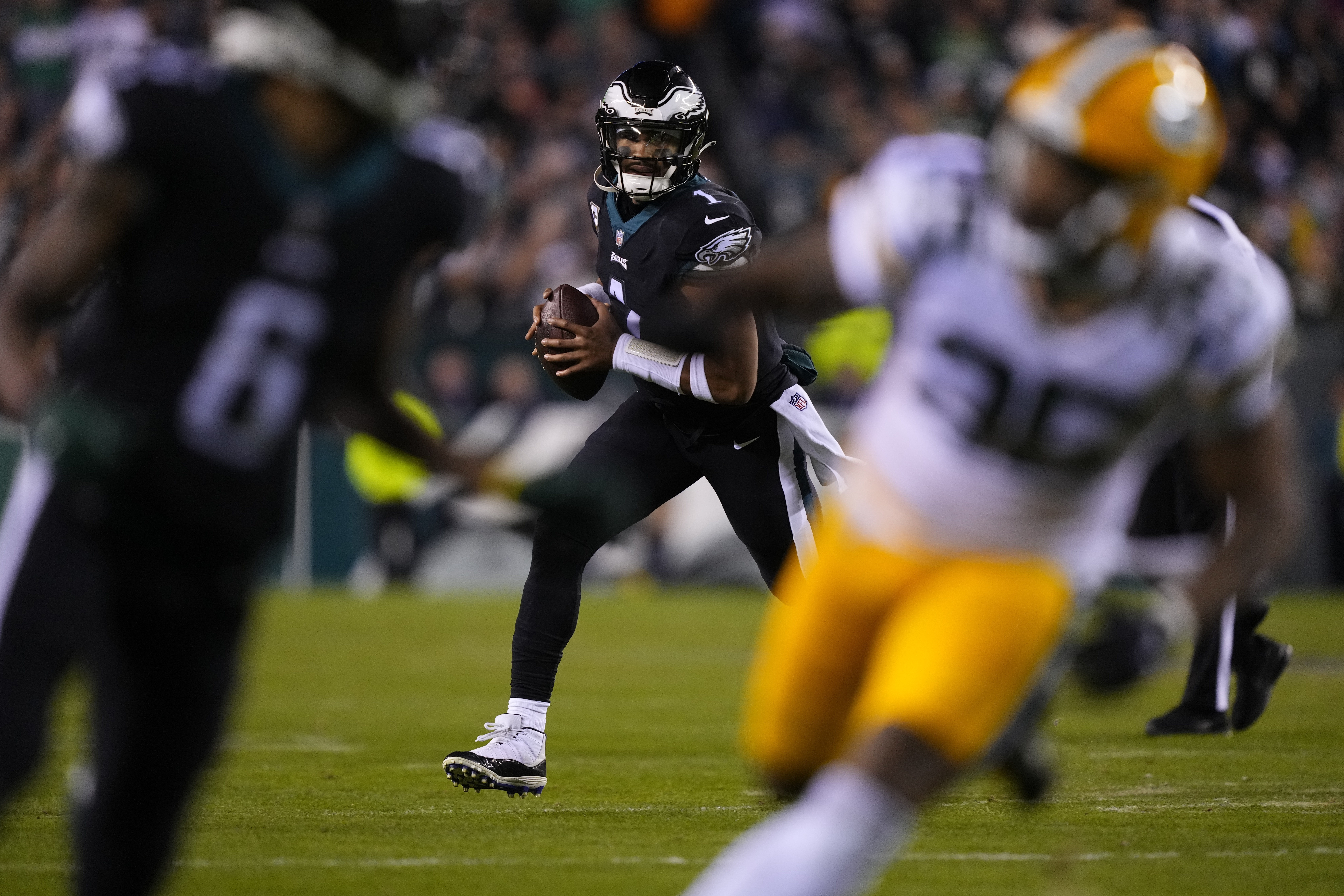 Green Bay Packers' AJ Dillon reacts after running for a touchdown during  the first half of an NFL football game against the Philadelphia Eagles,  Sunday, Nov. 27, 2022, in Philadelphia. (AP Photo/Matt