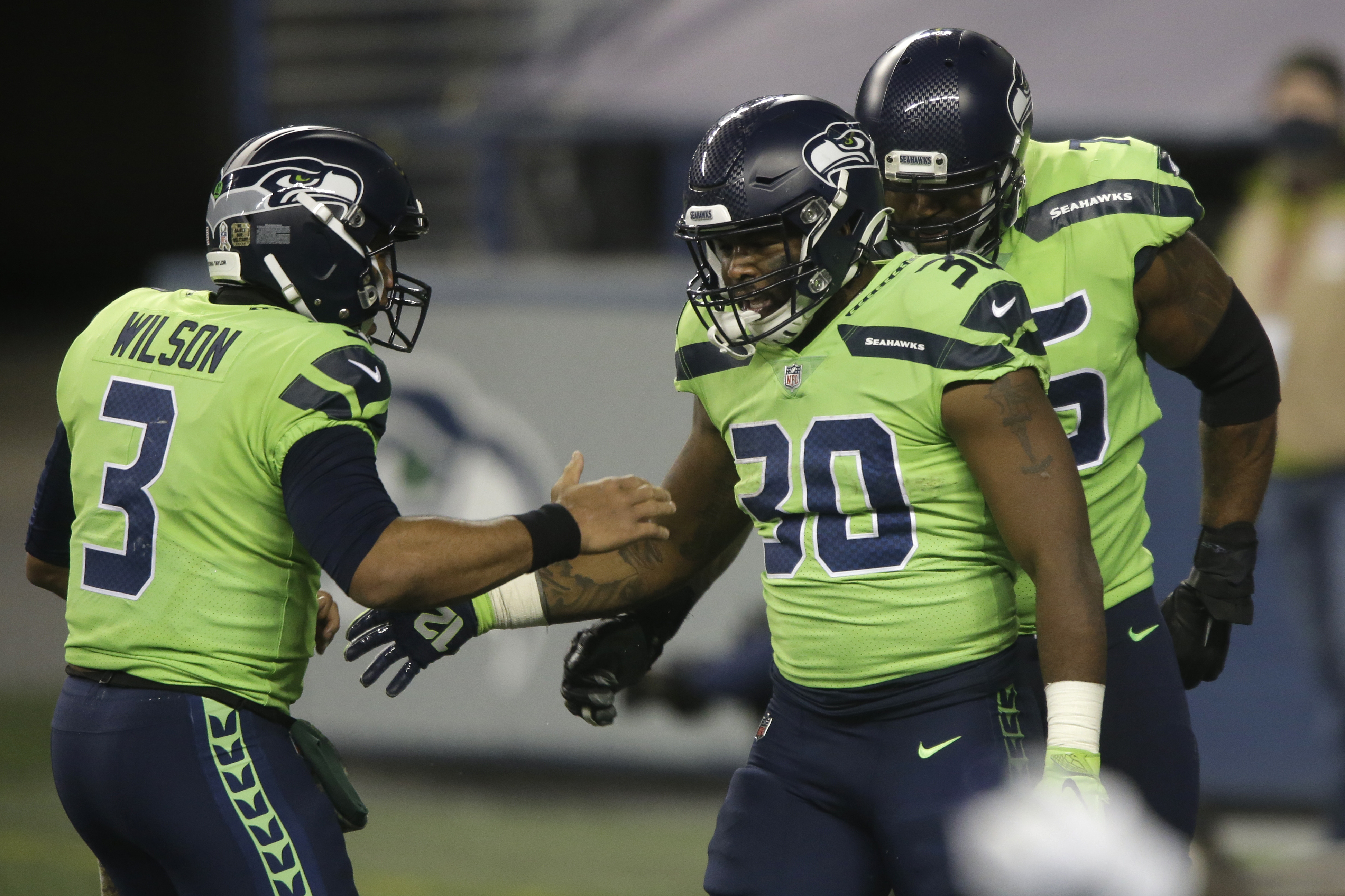 Seattle Seahawks' Carlos Dunlap on Russell Wilson: 'He told me