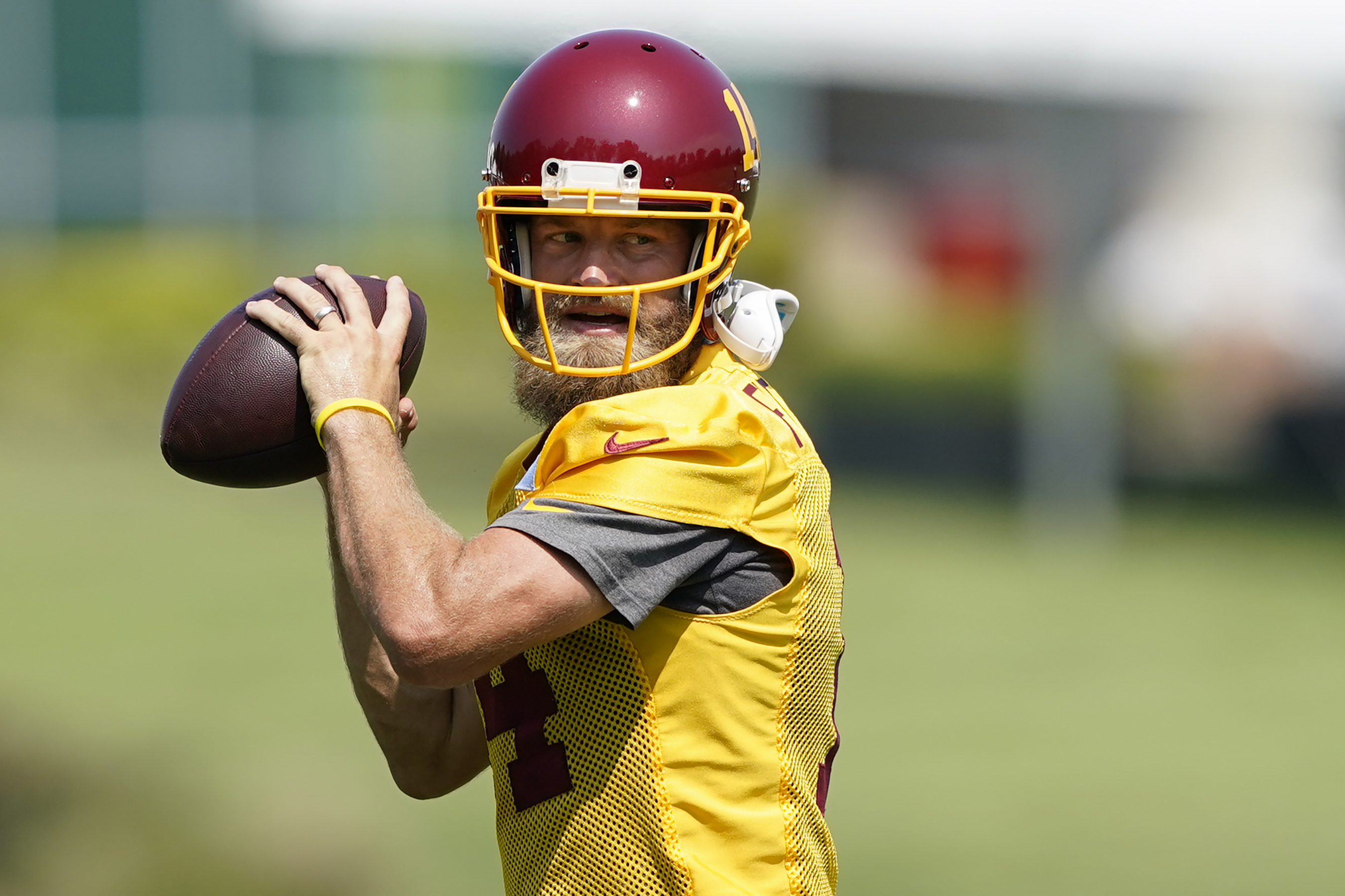 Washington Football Team quarterback Ryan Fitzpatrick throws a