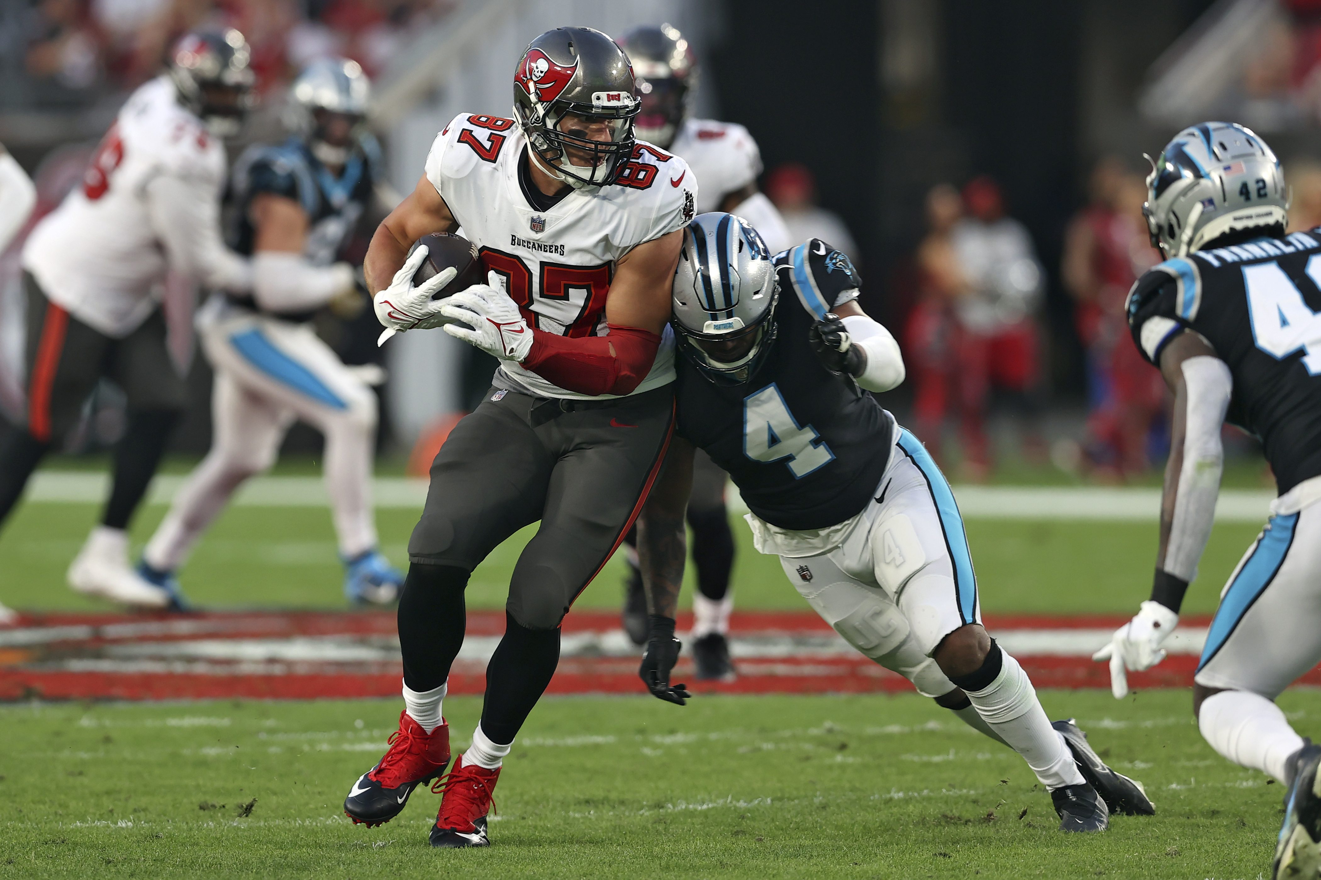 Tampa Bay Buccaneers' Cyril Grayson, left, celebrates as he leaves