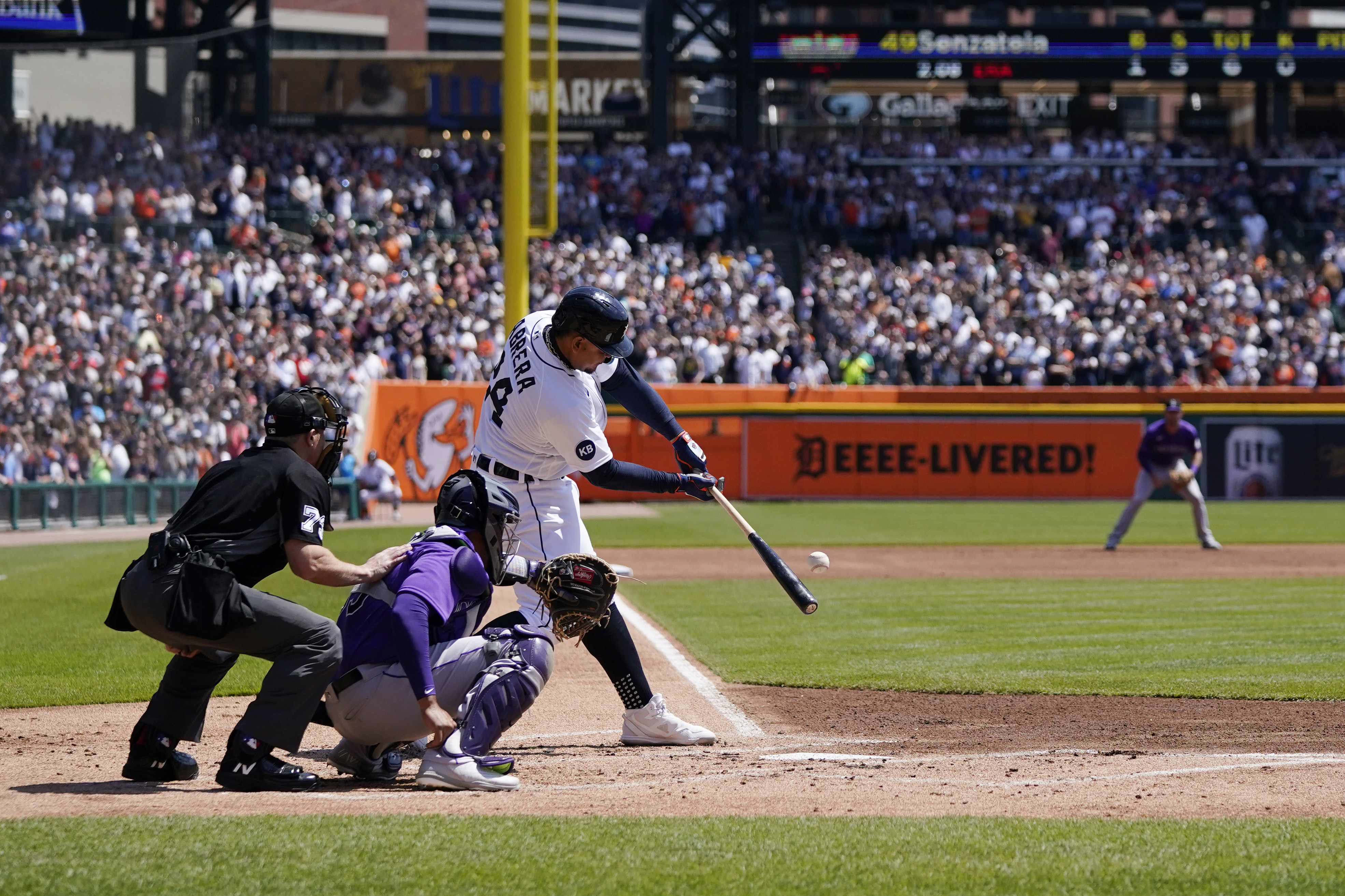 Detroit Tigers designated hitter Miguel Cabrera kisses his son