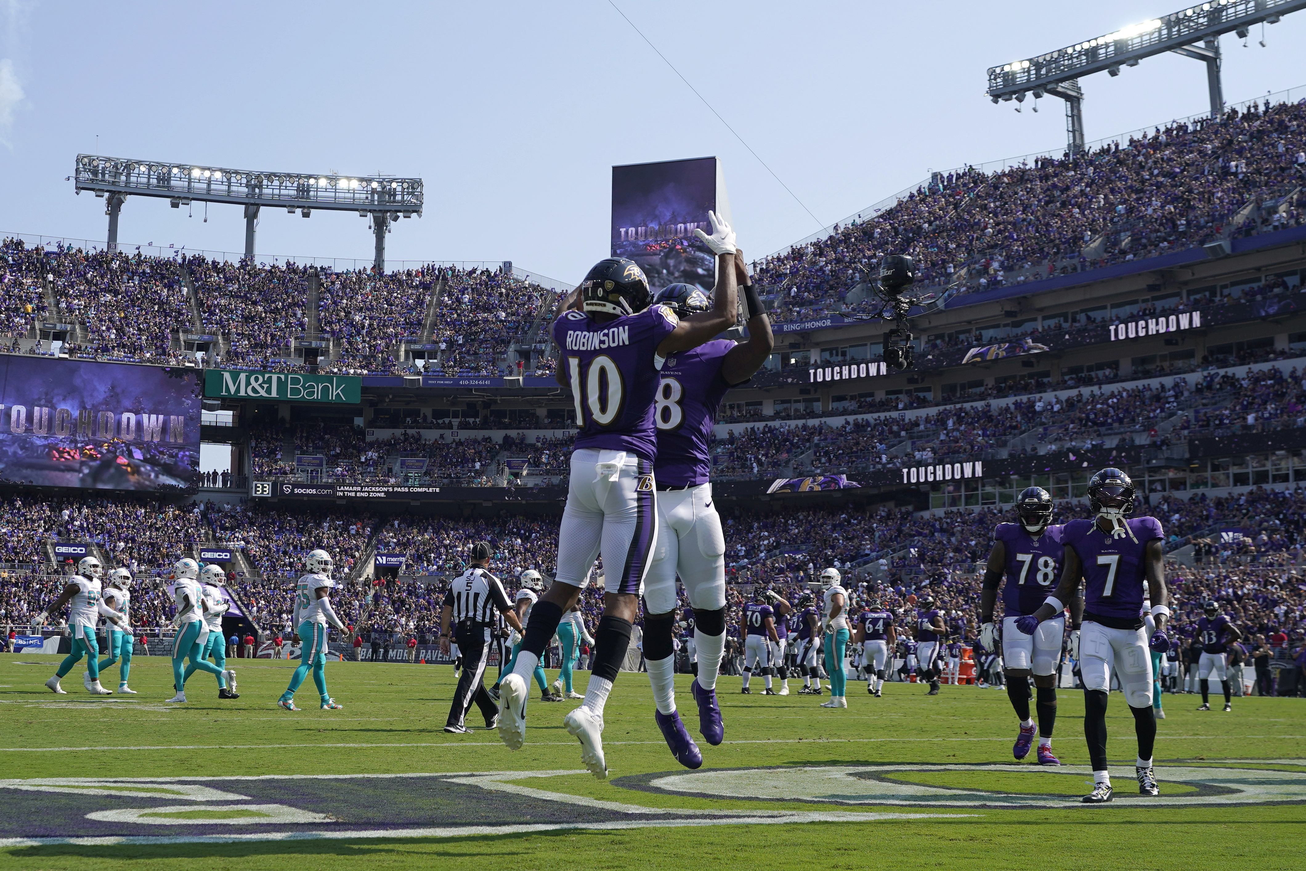 Dolphins rally from 21 down to beat Ravens 42-38 with Tagovailoa's 6 TD  passes