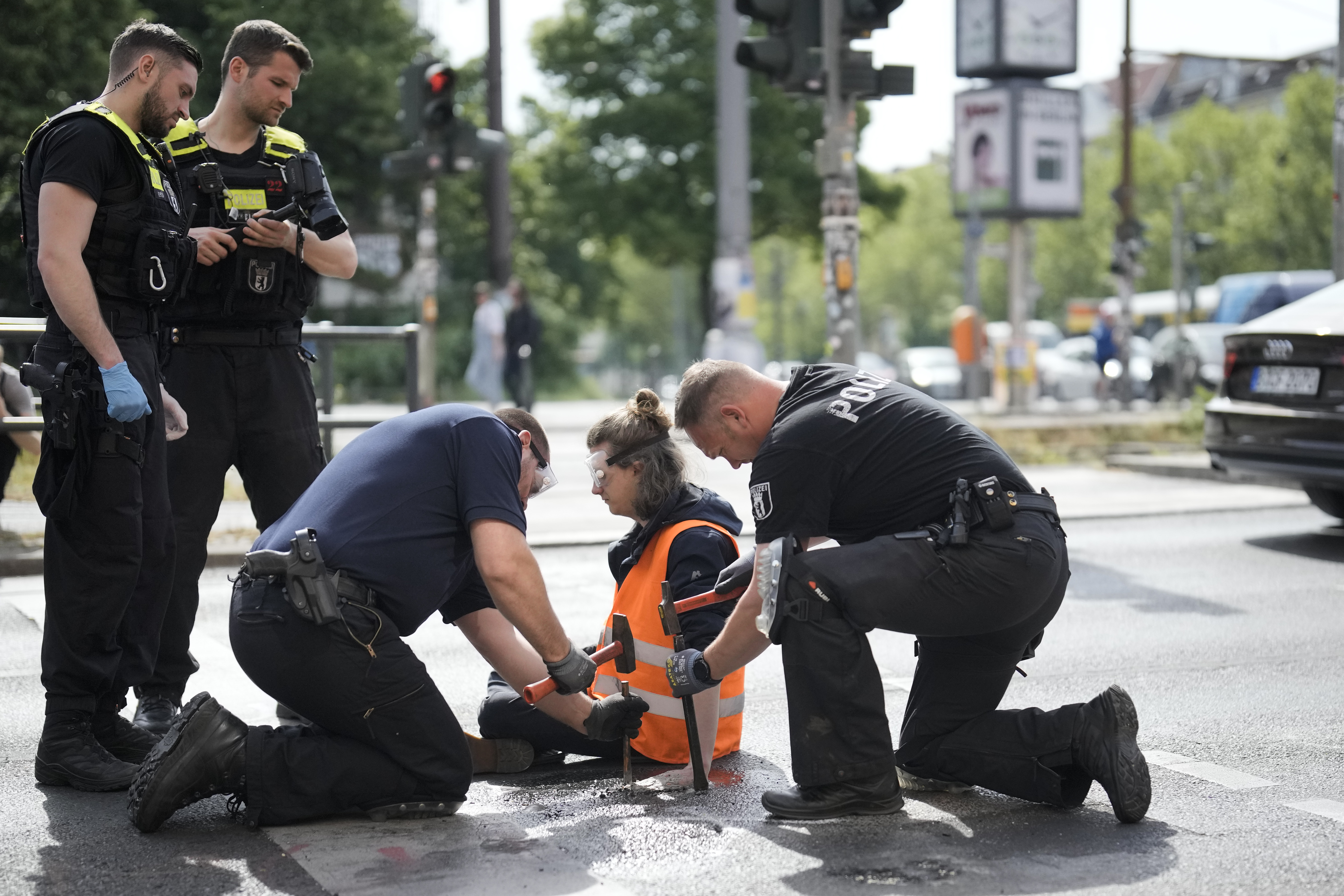 German police conduct raids on climate activists as impatience mounts