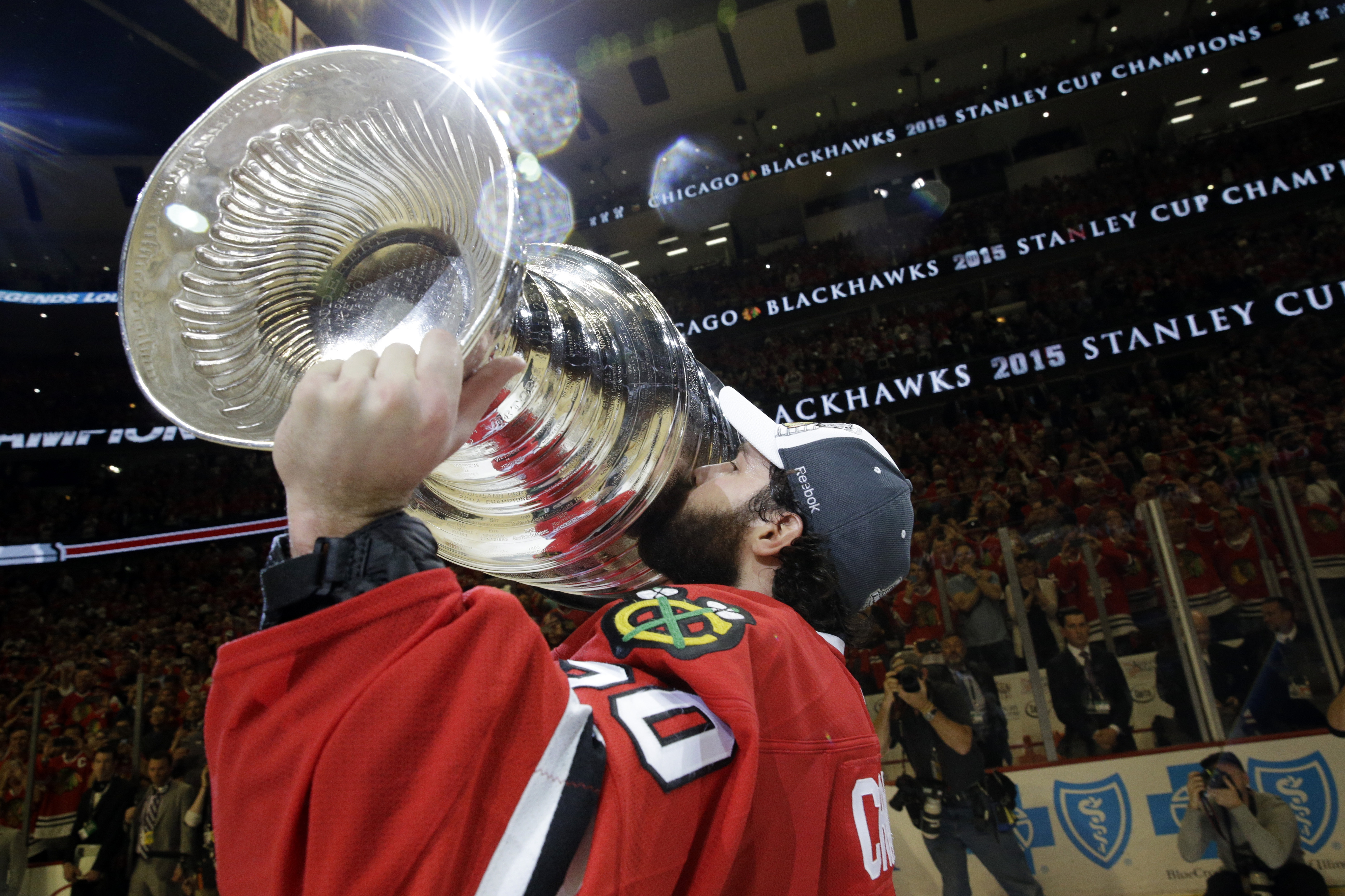 Patrick Kane raises Stanley Cup Trophy