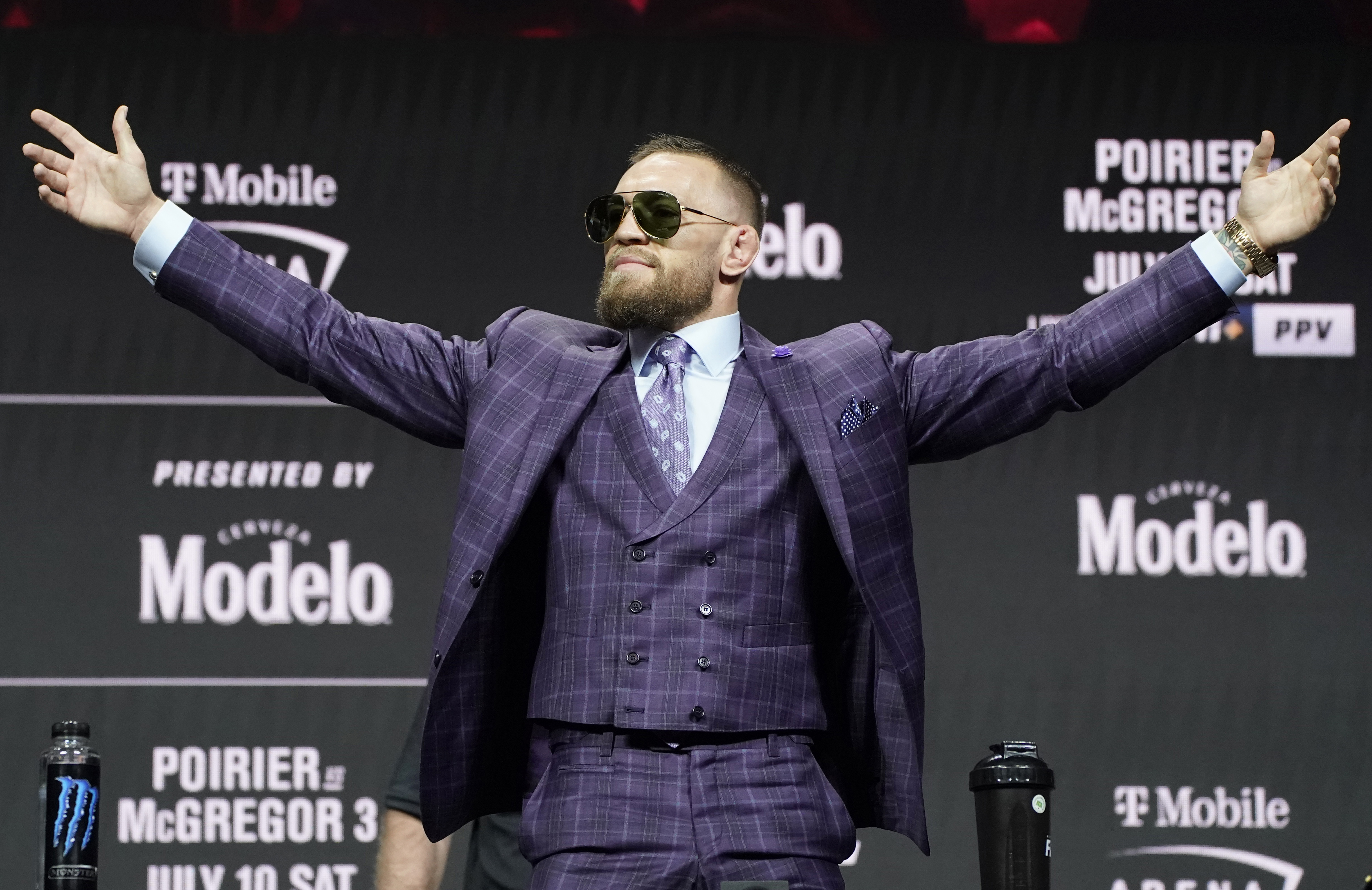 UFC 264: Conor McGregor throws kick at Dustin Poirier, insults his wife in  heated press conference