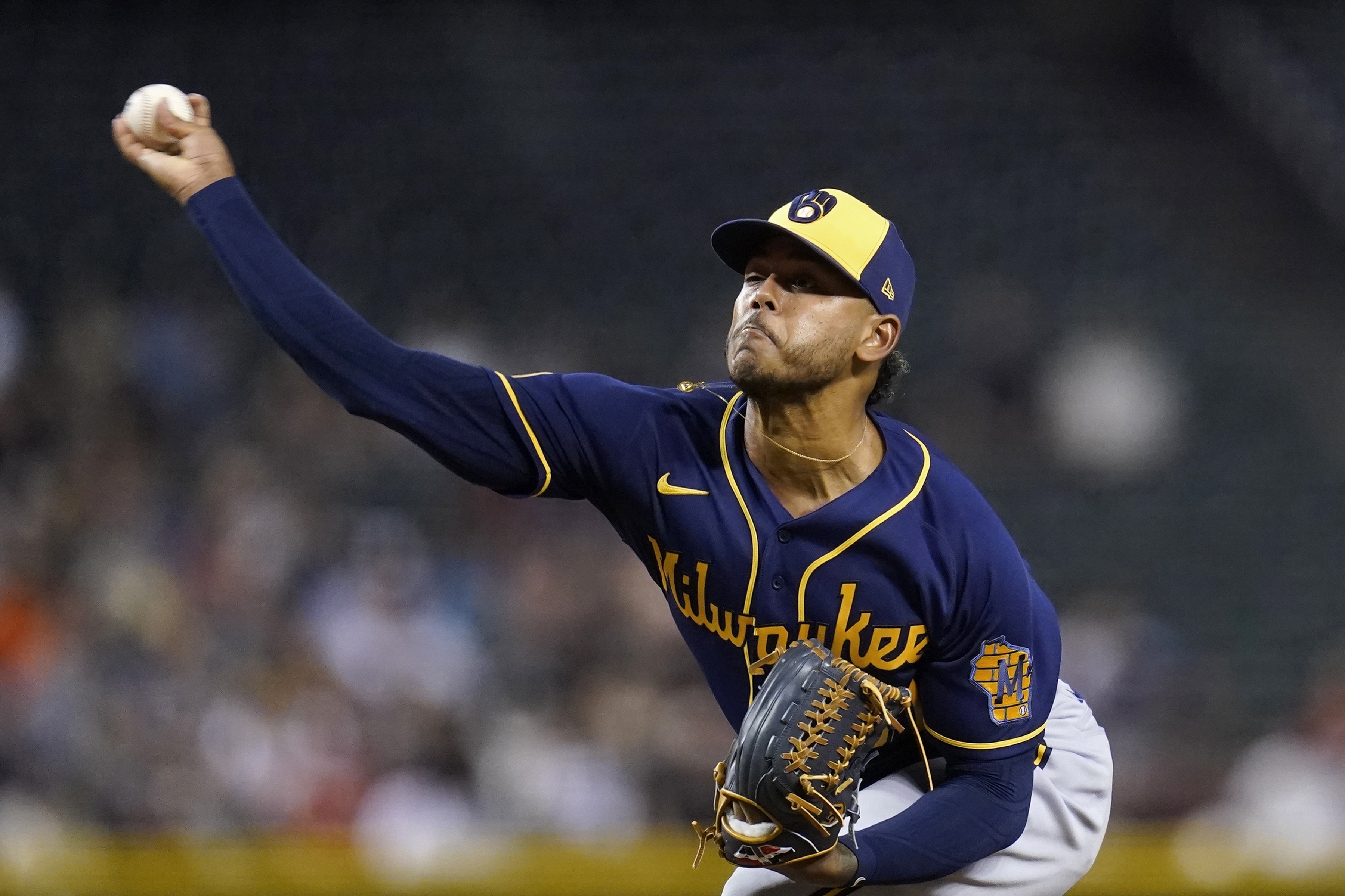 Vogelbach somehow hobbles home, Brewers top Diamondbacks 5-0