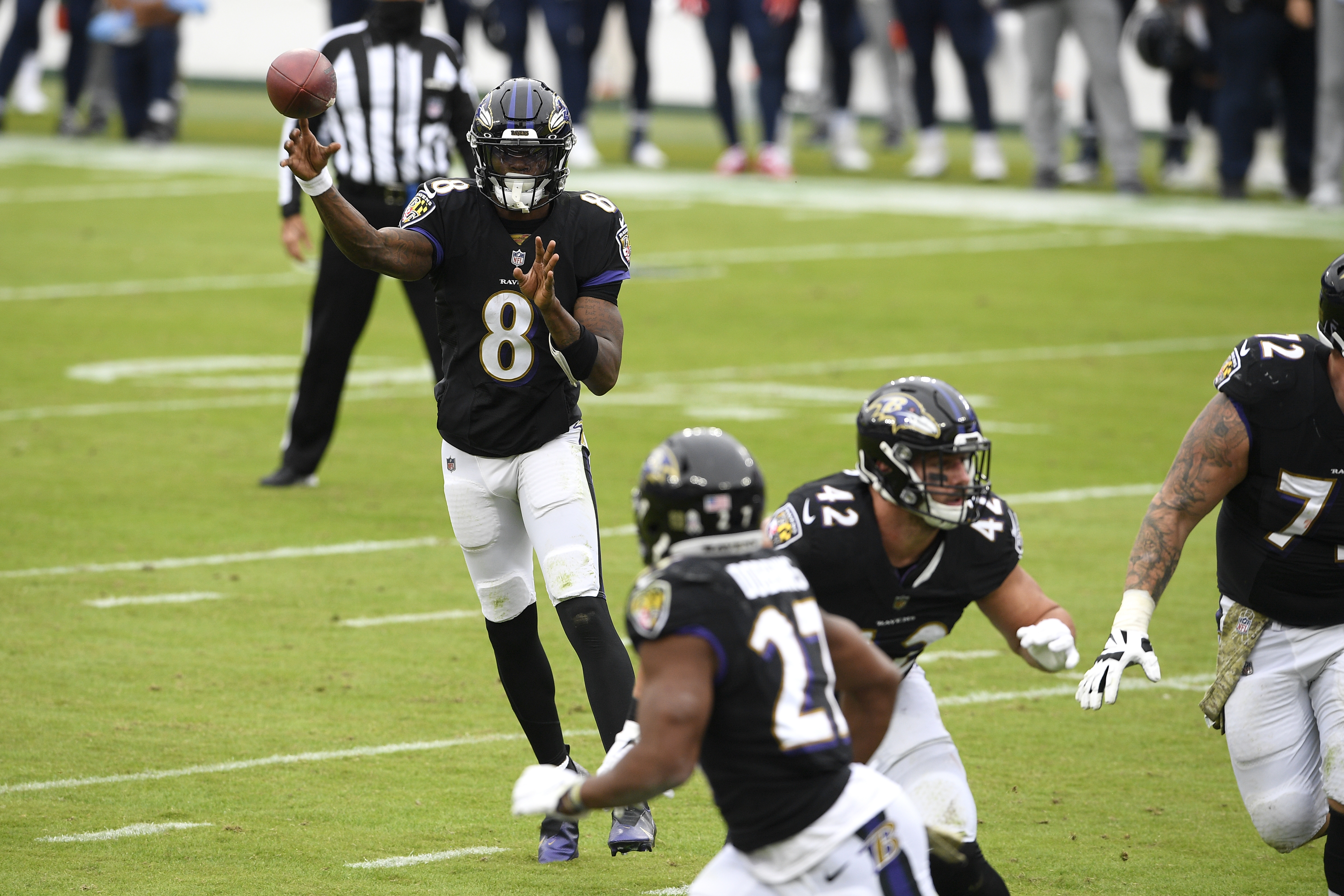 Henry's TD run in OT lifts Titans over skidding Ravens 30-24