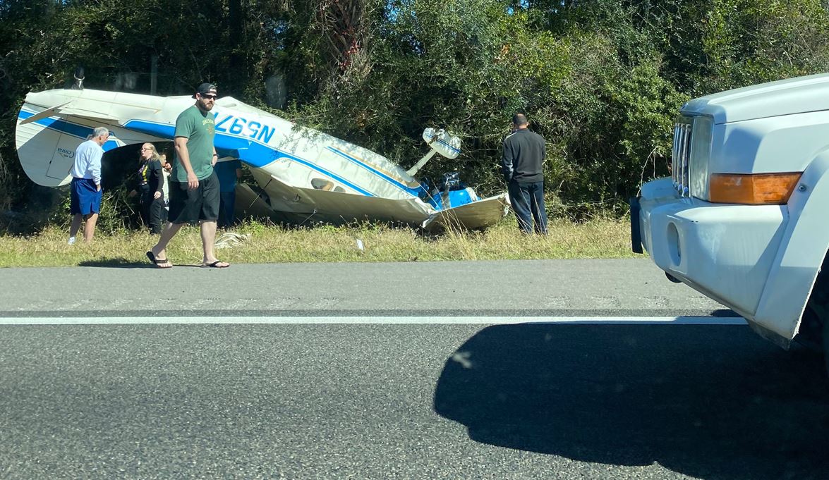 Small plane crashes into car during emergency landing in North