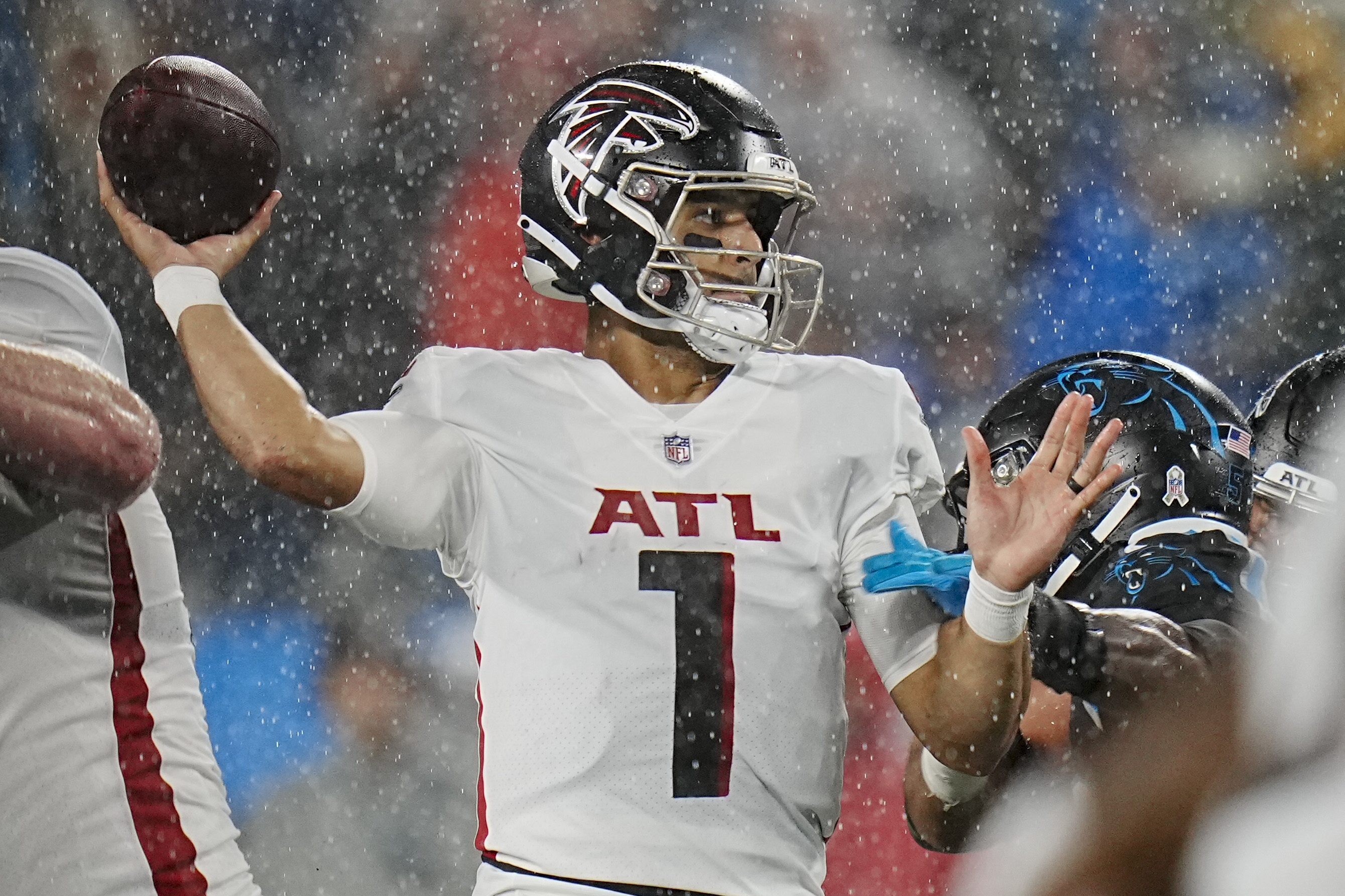 Carolina Panthers run riot over Atlanta Falcons in rain-soaked