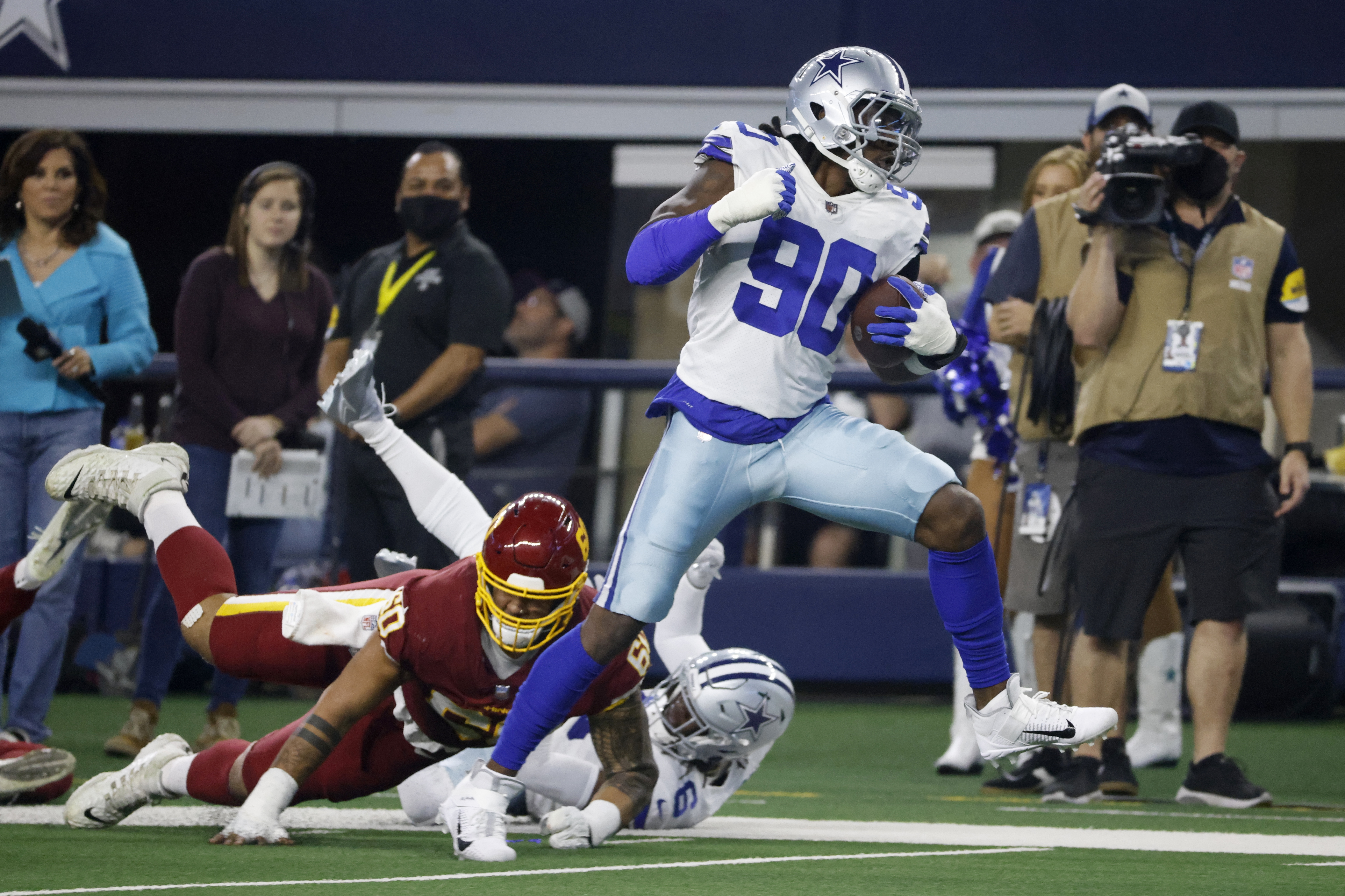 Dallas Cowboys running back Corey Clement (32) catches a return