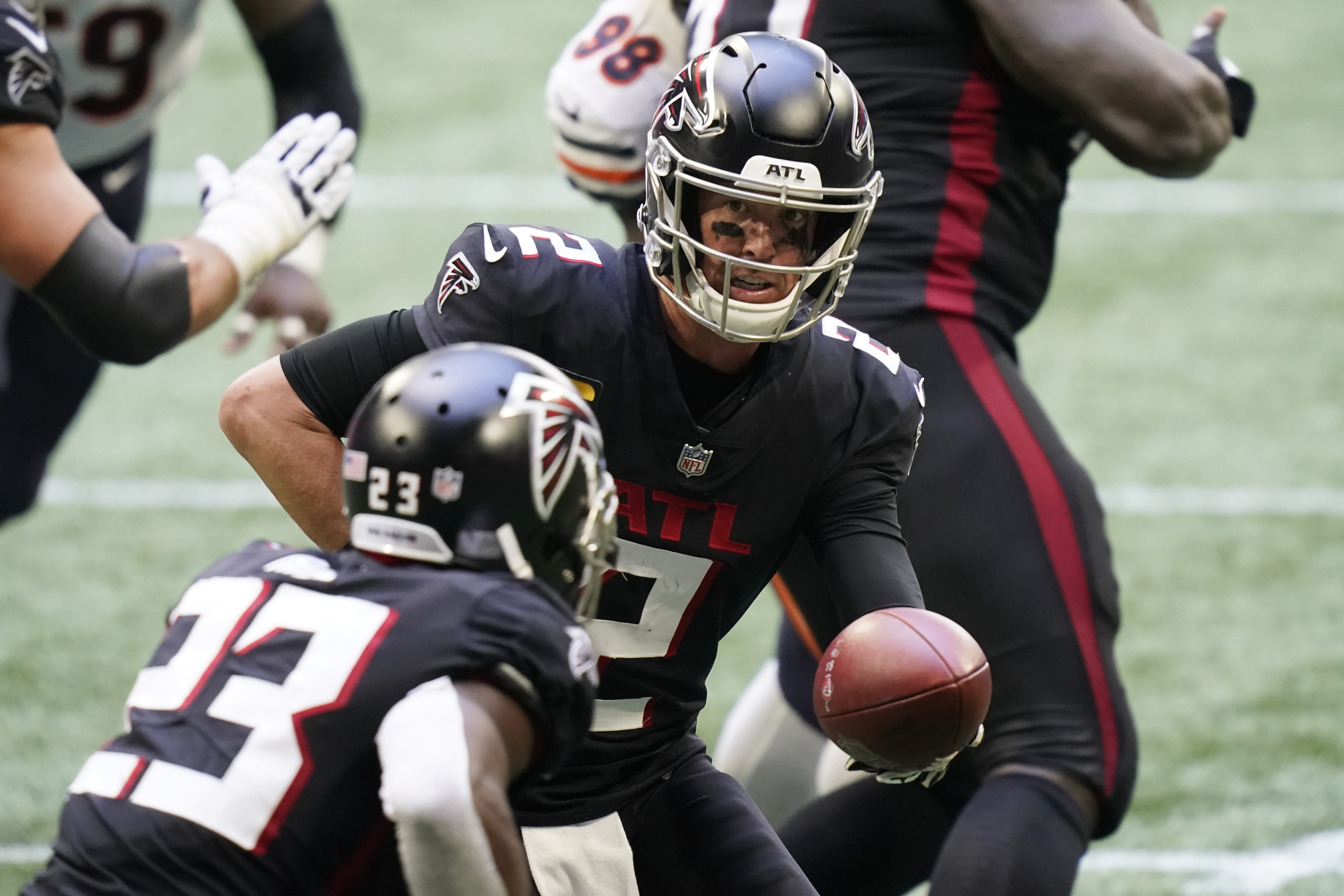 Atlanta Falcons running back Todd Gurley (21) works against the Chicago  Bears during the second half of an NFL football game, Sunday, Sept. 27,  2020, in Atlanta. The Chicago Bears won 30-26. (