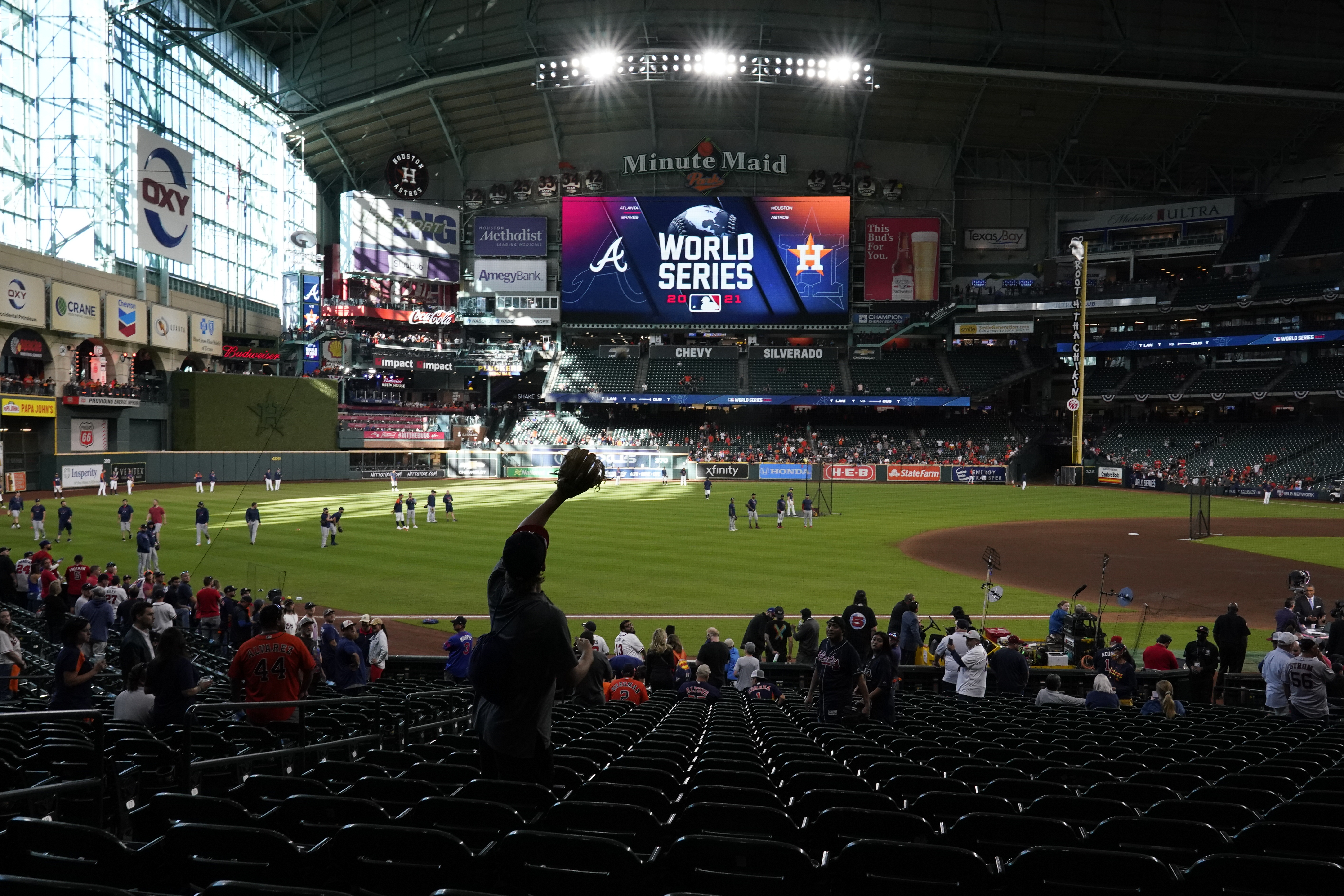 Houston, USA. 27th Oct, 2021. Atlanta Braves left fielder Eddie Rosario  catches a long fly ball from Houston Astros Yuli Gurriel in the 4th inning  in game two in the MLB World