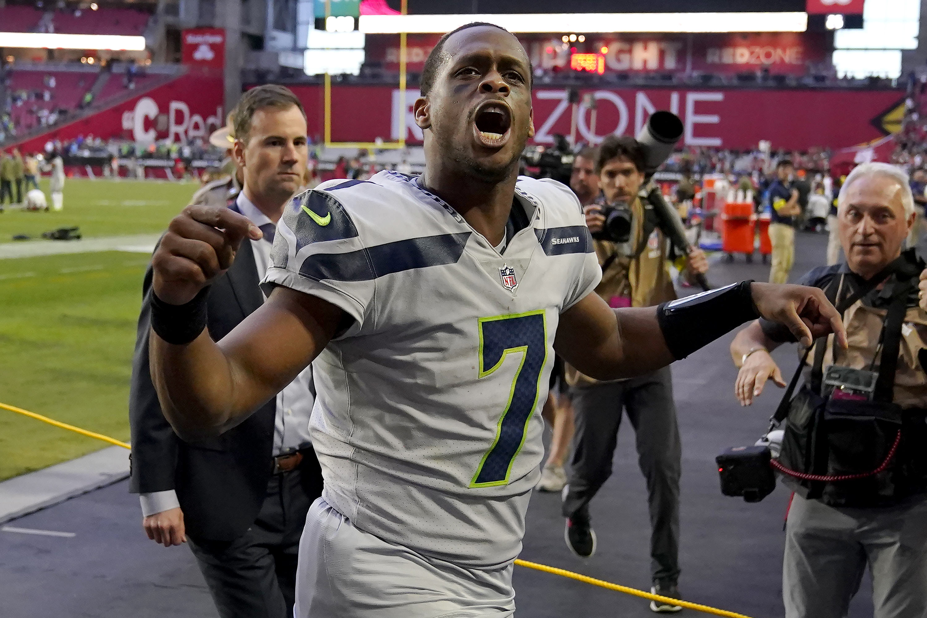 Russell Wilson, Pete Carroll Snipe at Each Other Over Playbook Wristbands