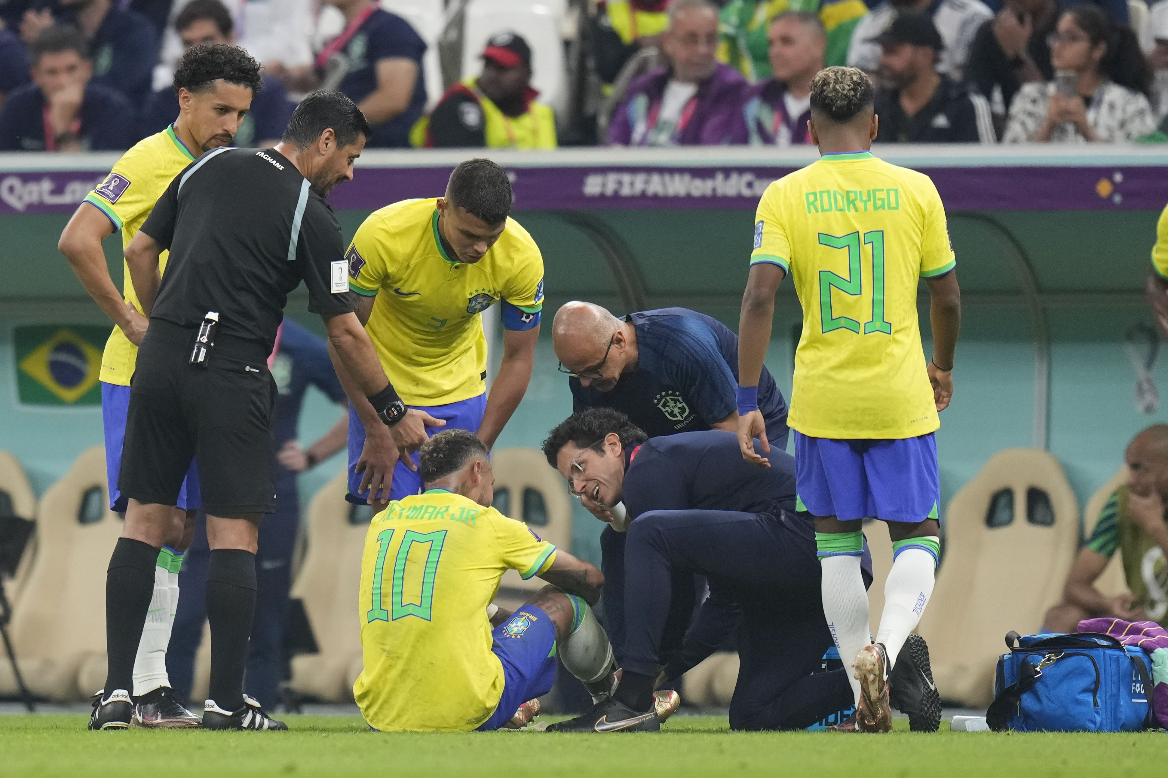 Watch Neymar limp out of stadium after suffering ankle injury as Brazil  boss insists he WILL play on at World Cup 2022