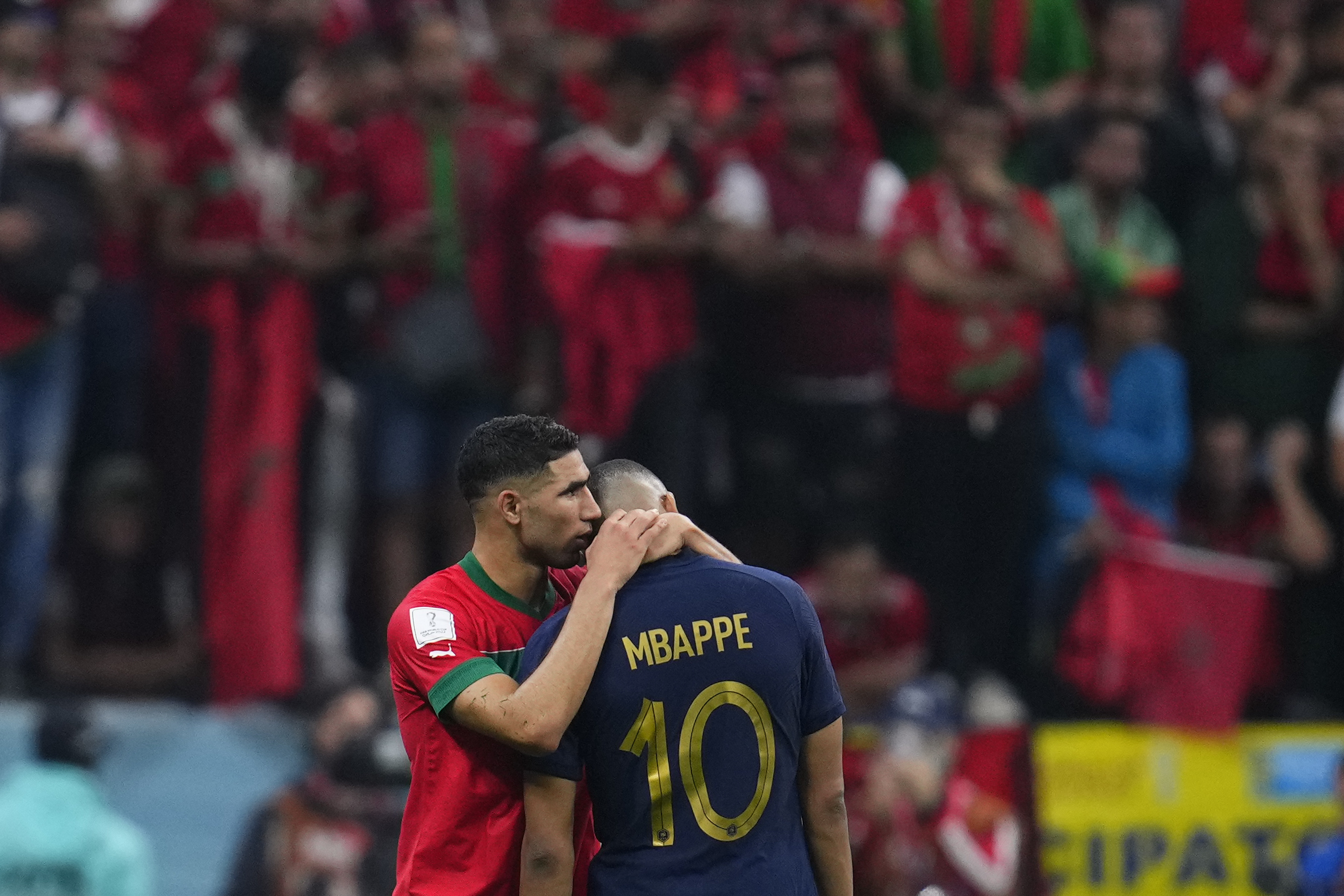 Kylian Mbappe of France exchanges his jersey with Achraf Hakimi of Morocco  following the FIFA World Cup 2022, Semi-final football match between France  and Morocco on December 14, 2022 at Al Bayt