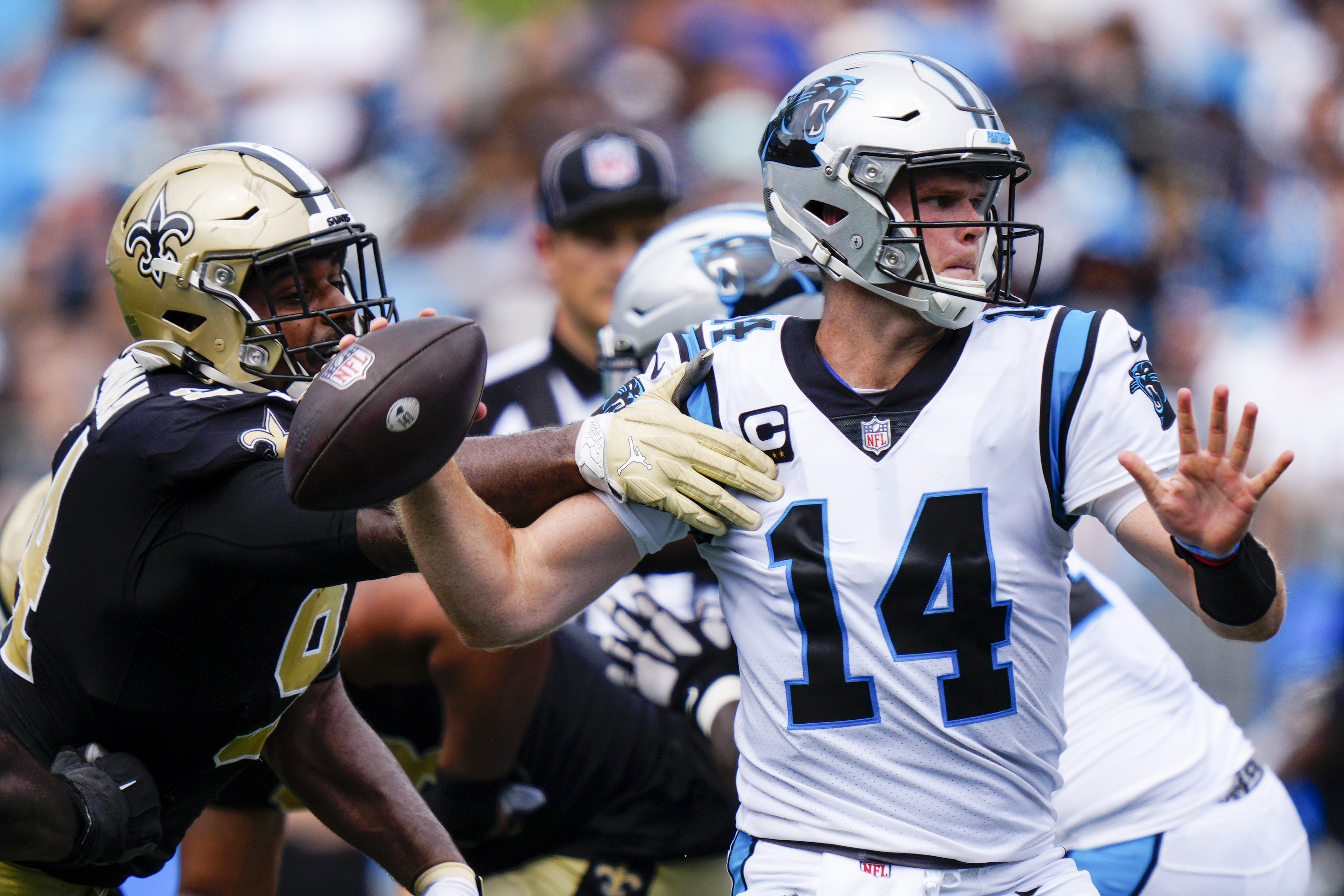 Darnold throws 2 TDs, Panthers D dominates Saints 26-7