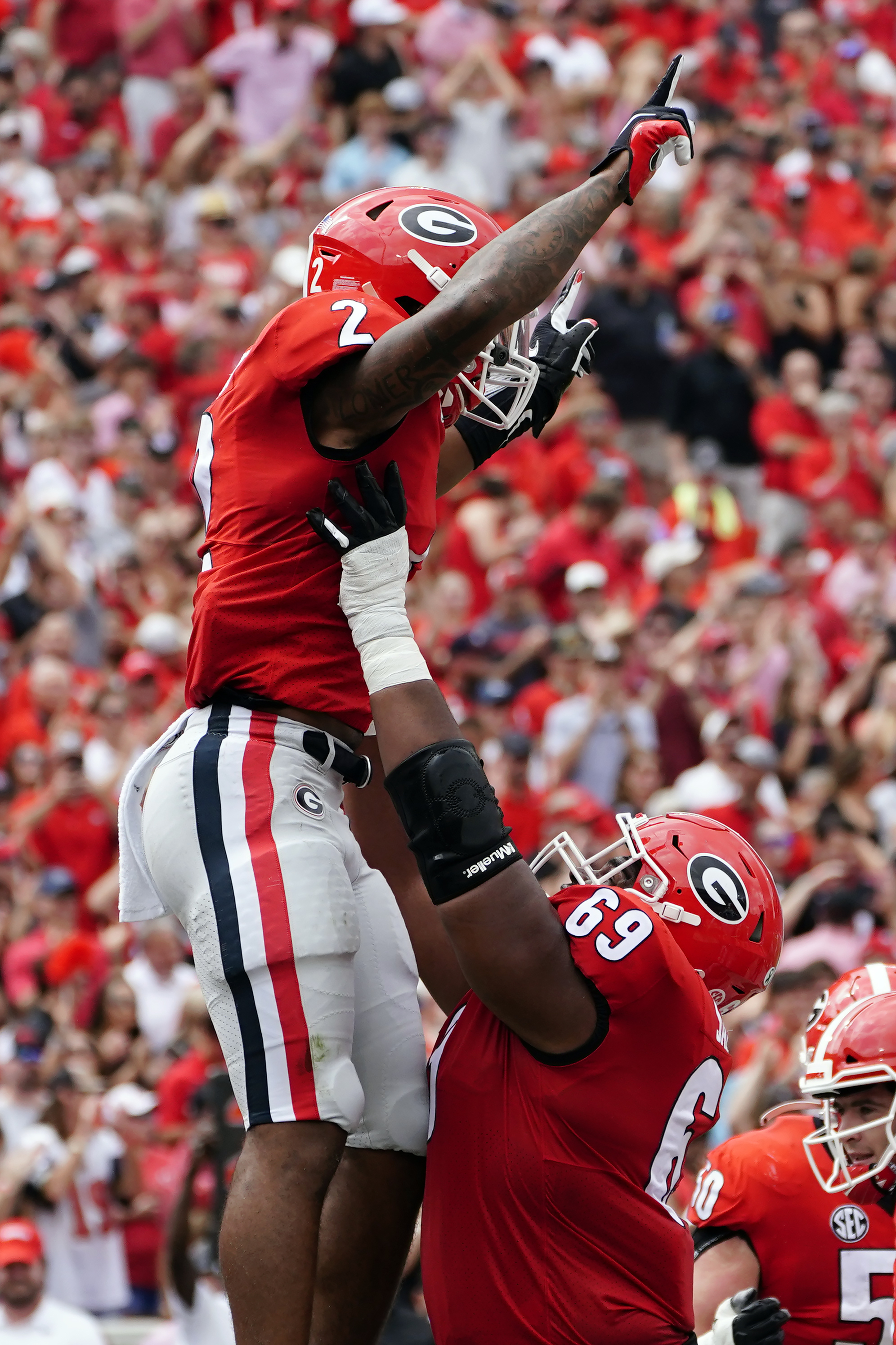 Georgia Star Nakobe Dean Wears Alabama Championship Hat