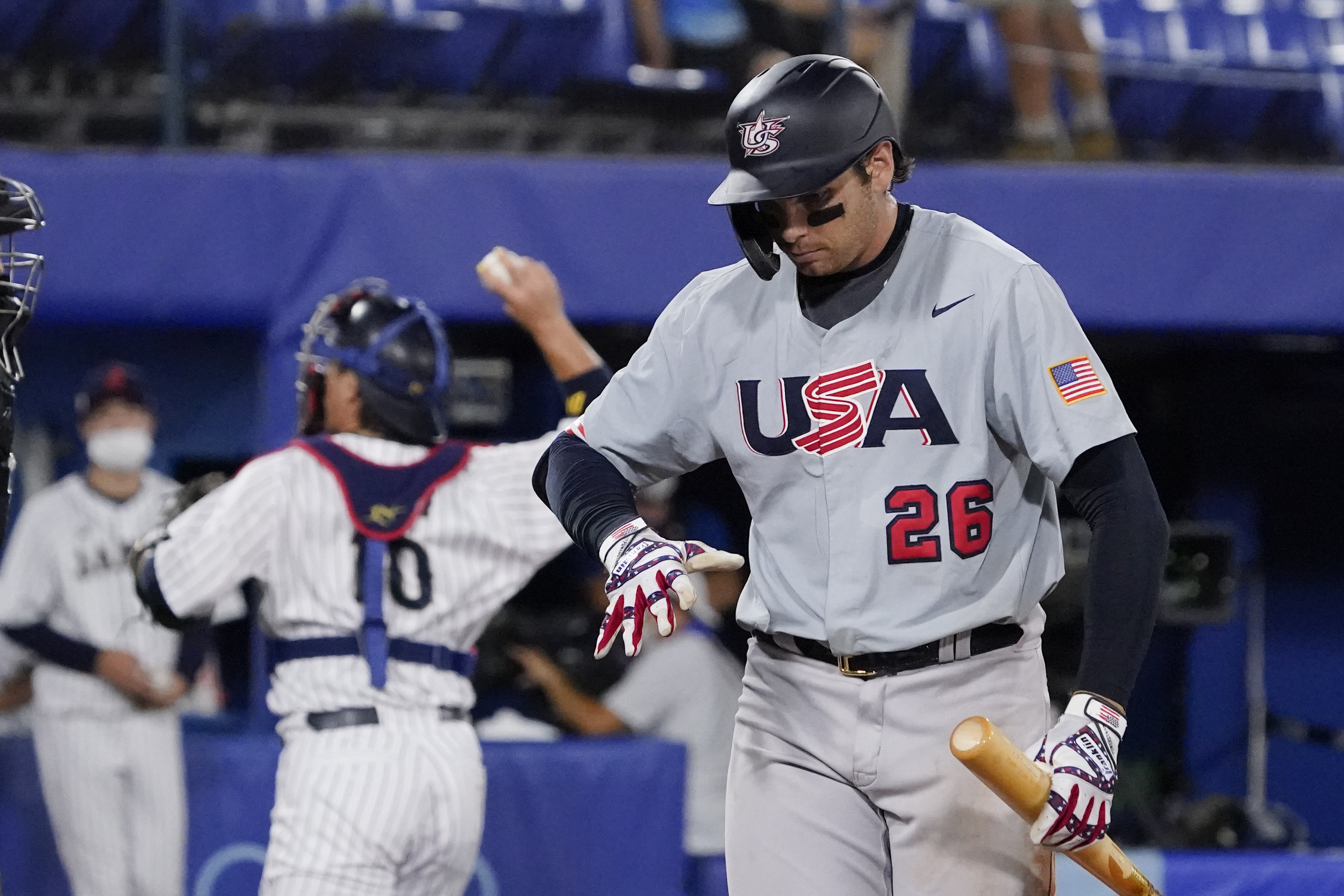 South Korea's Hyeseong Kim runs to first after hitting a game