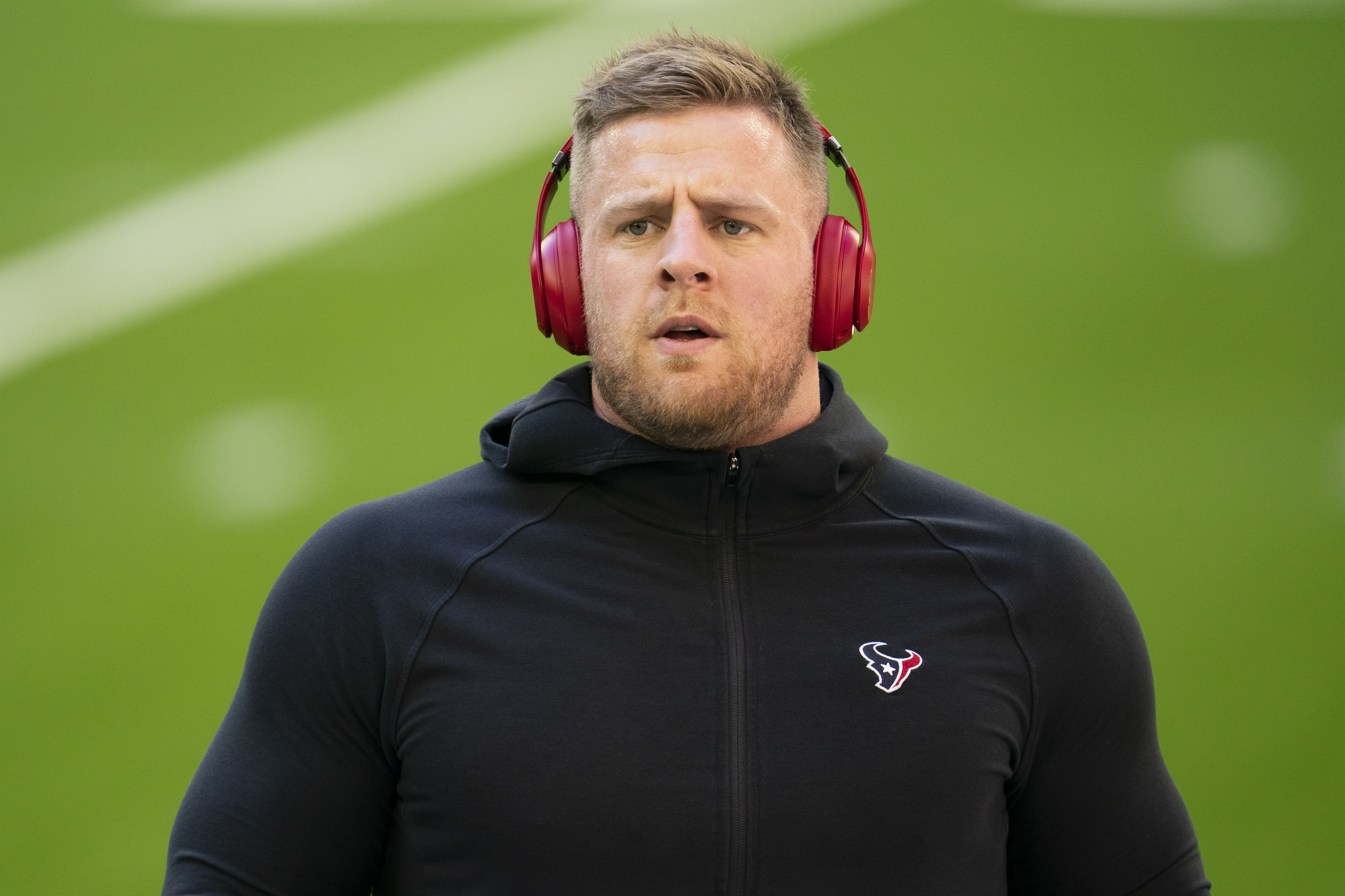 JJ Watt with Baby Son at Houston Texans Ring of Honor Induction