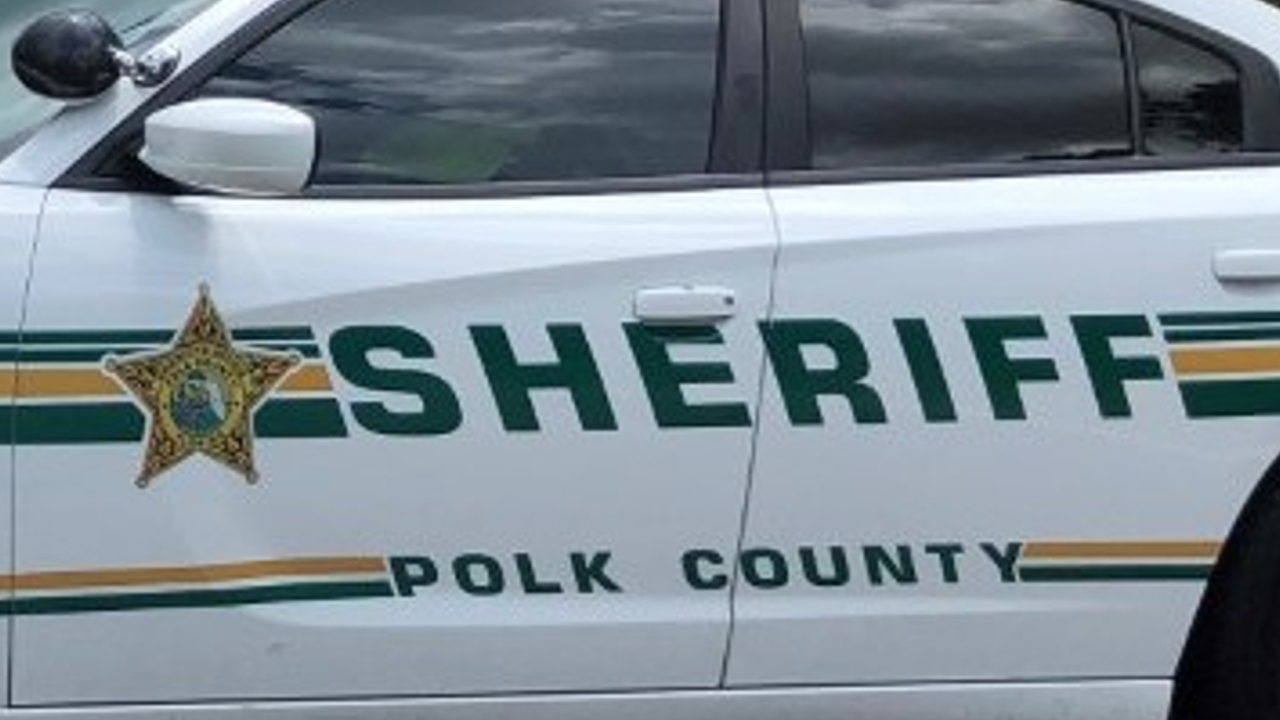 Man dead after vehicle crashes into Polk County motel