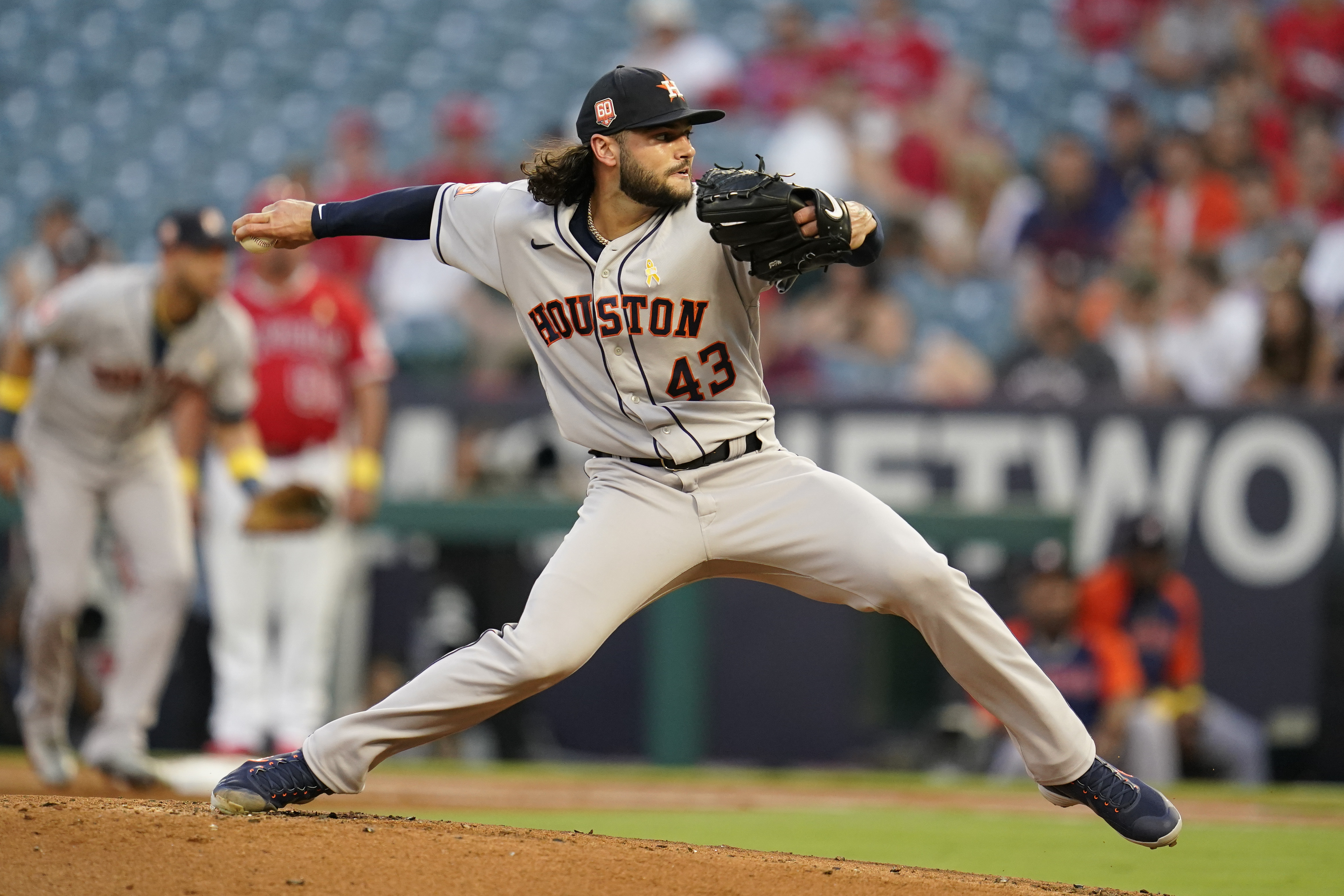 McCullers sharp again, pitches into 6th as Astros top Angels