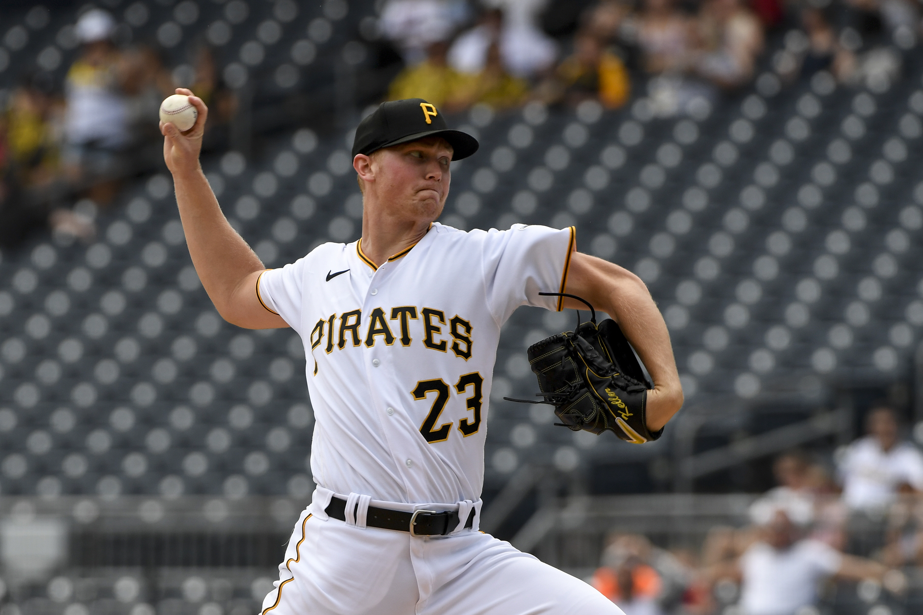 Pirates end losing skid, rally to edge Marlins 3-1
