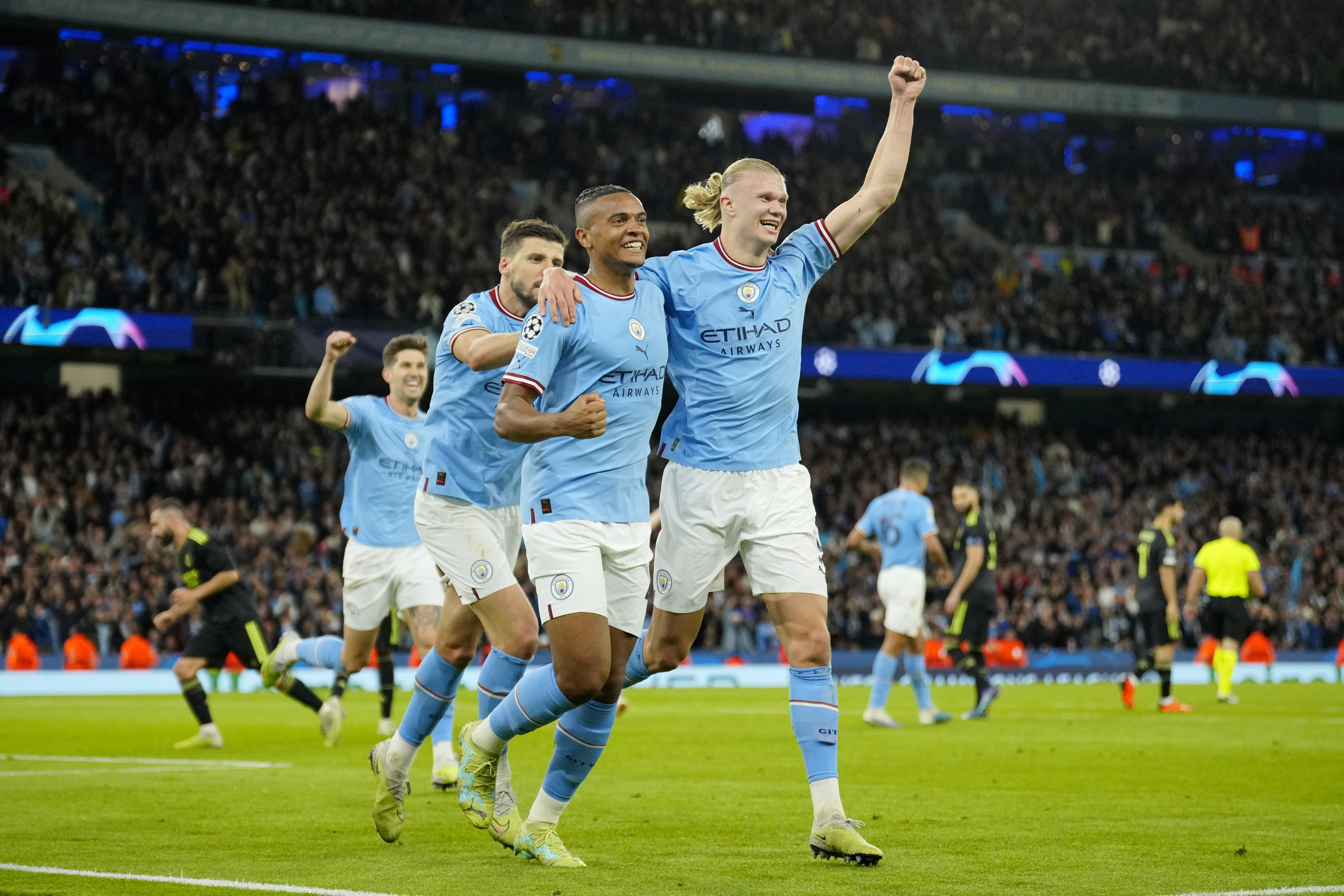 Real Madrid's Eder Militao heads the ball during the Champions League  semifinal second leg soccer match between Manchester City and Real Madrid  at Etihad stadium in Manchester, England, Wednesday, May 17, 2023. (