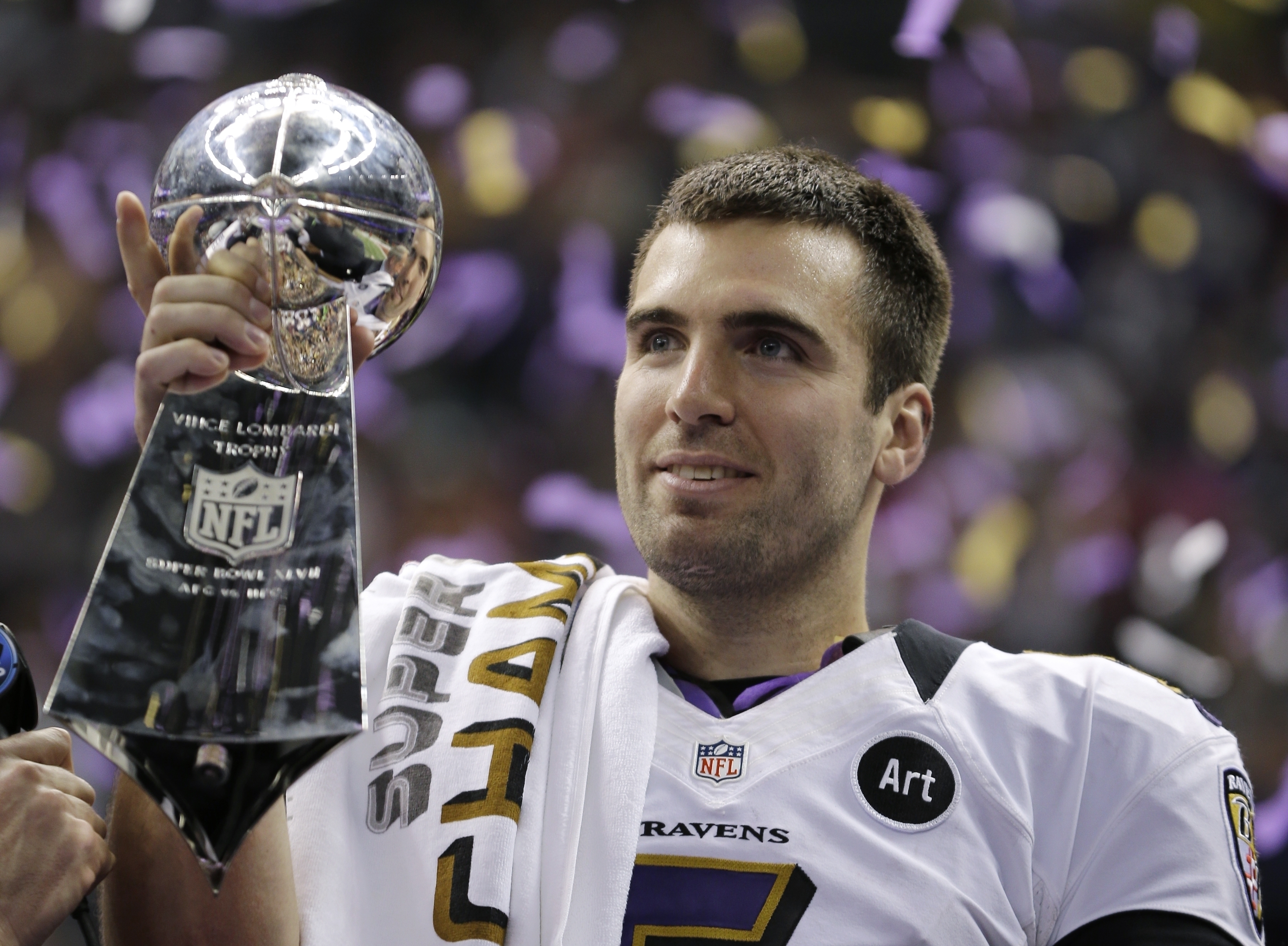 Baltimore Ravens QB Joe Flacco (5) drops back to pass in the first