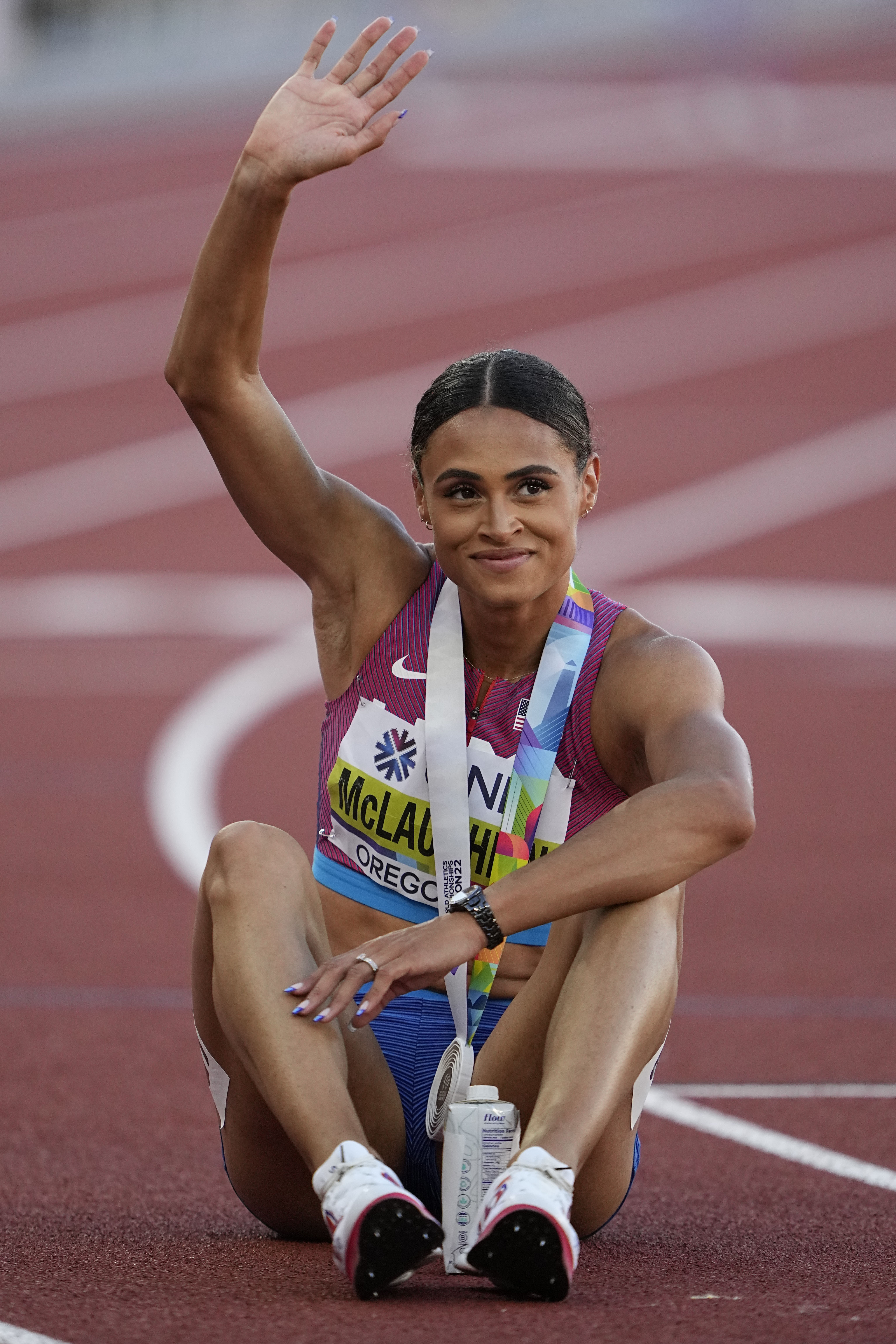 Who is women's 400m hurdles world record holder Sydney McLaughlin's NFL  star husband?