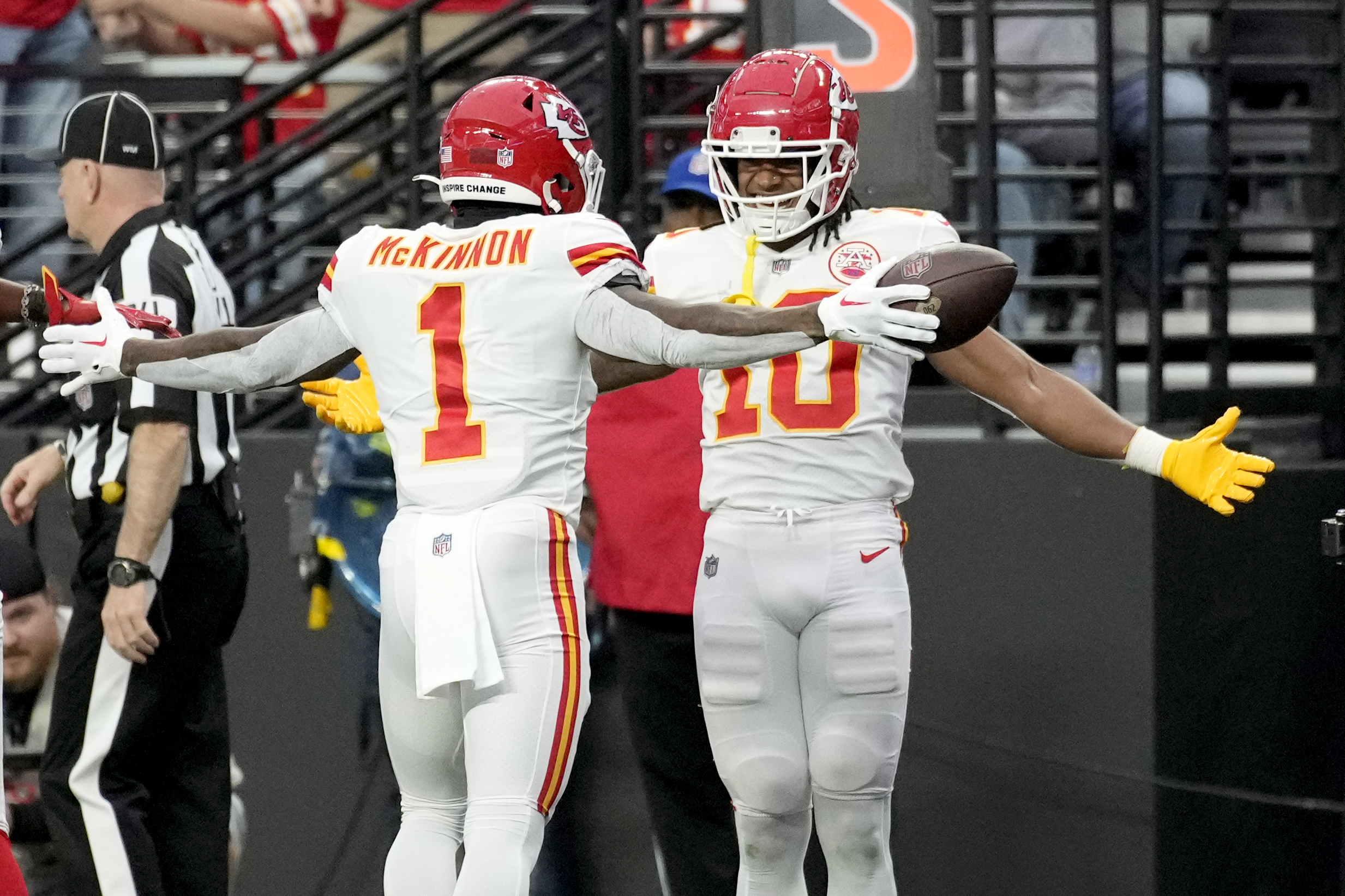 Kansas City Chiefs running back Jerick McKinnon (1) celebrates with  teammates after a Chiefs touchdown against the Las Vegas Raiders in an NFL  football game, Saturday, Jan. 7, 2023, in Las Vegas