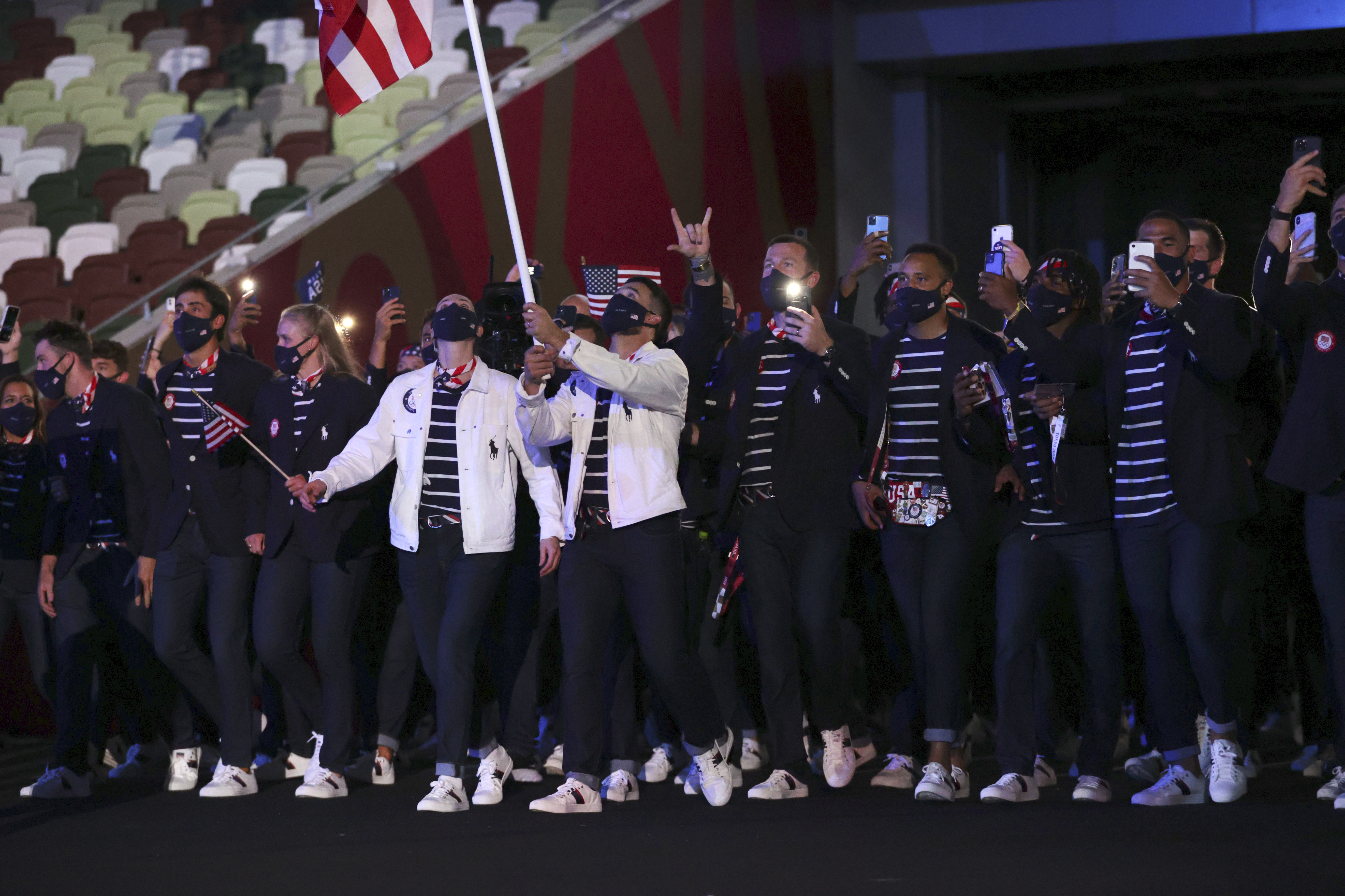 Hideki Matsui carries torch at Olympic Opening Ceremony