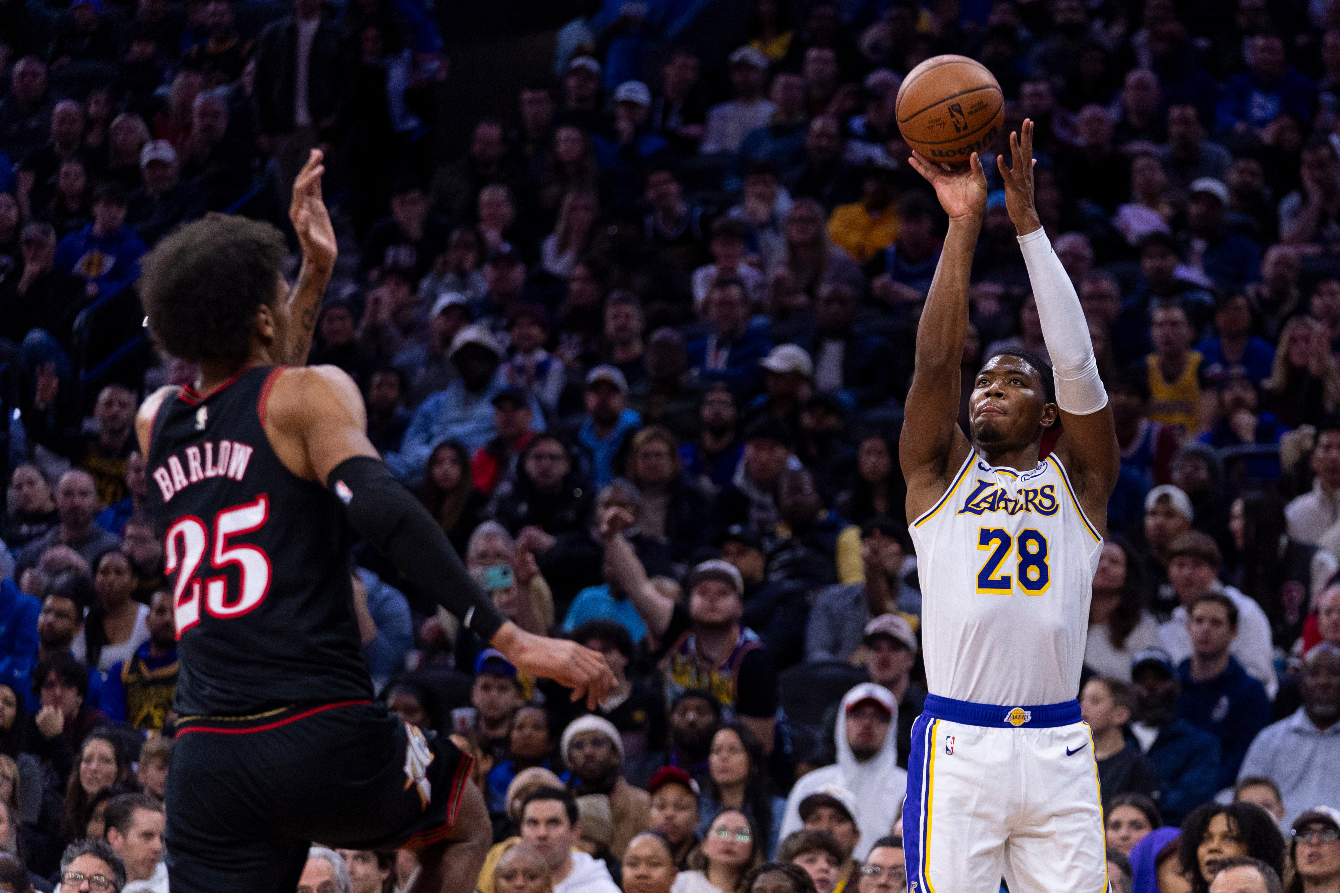 James hits go-ahead 3 and scores 29 points, Doncic has triple