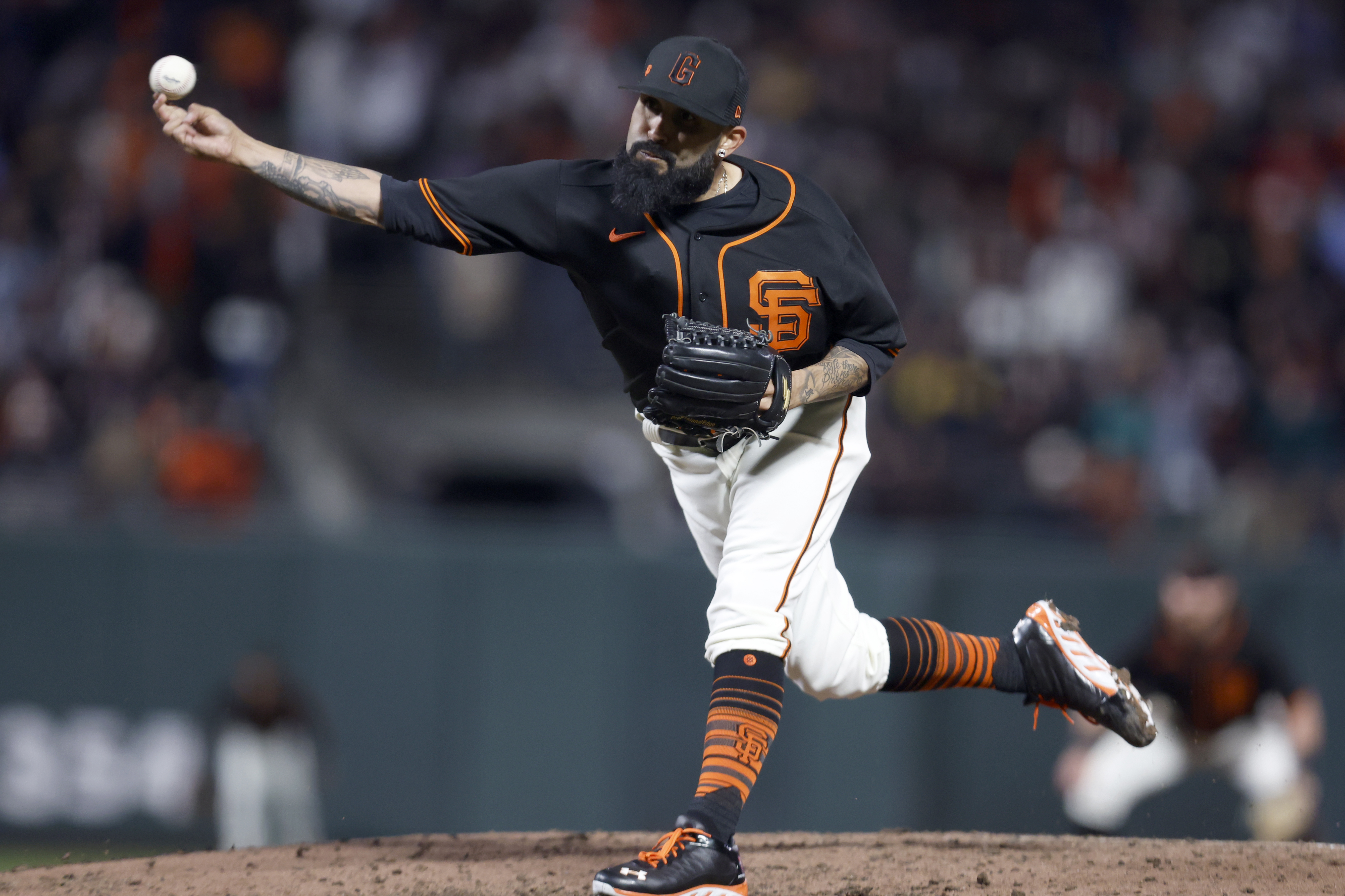 Sergio Romo throws an emotional last ball for the Giants as he
