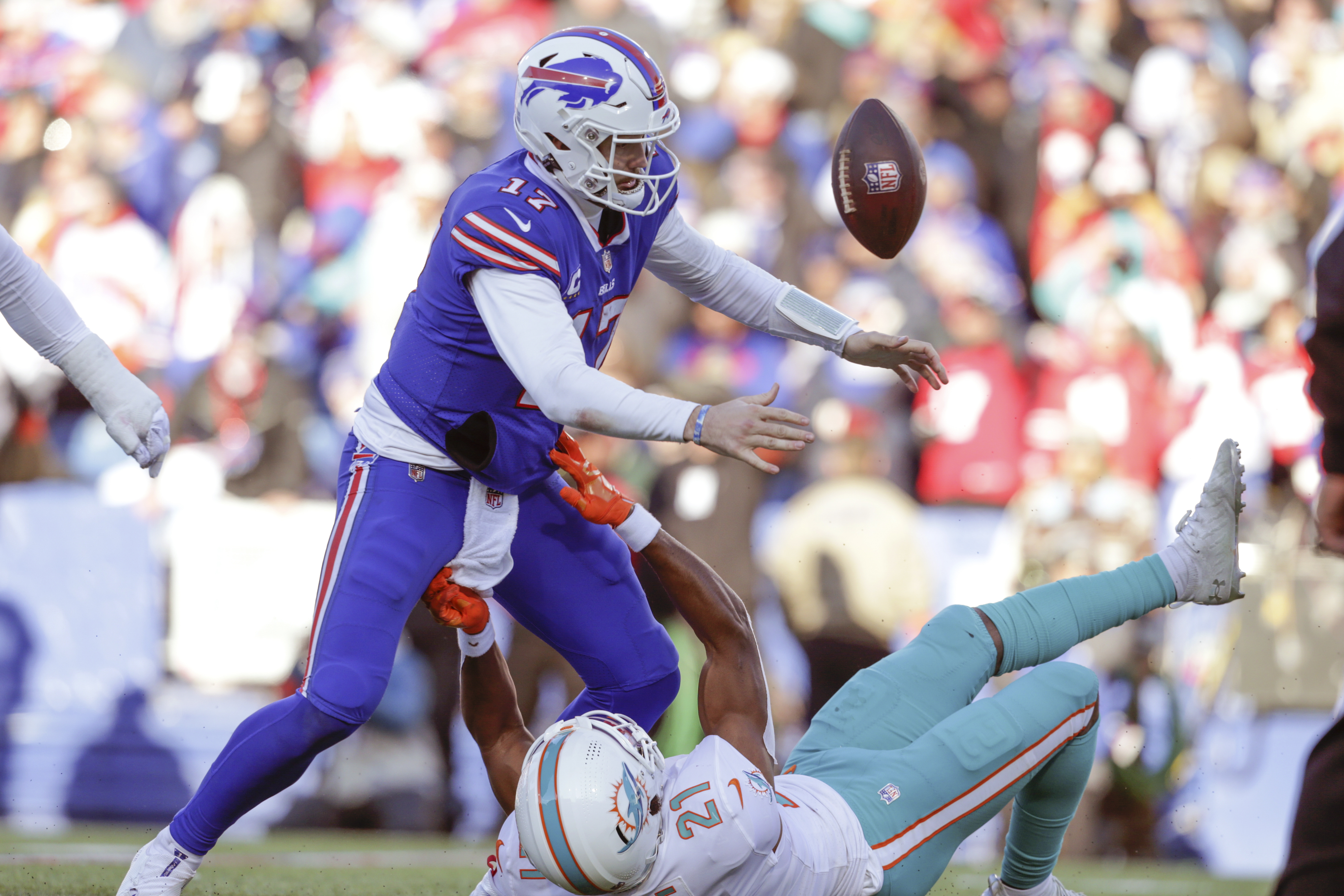 Bills hang on for 34-31 wild-card win over Dolphins – The Denver Post