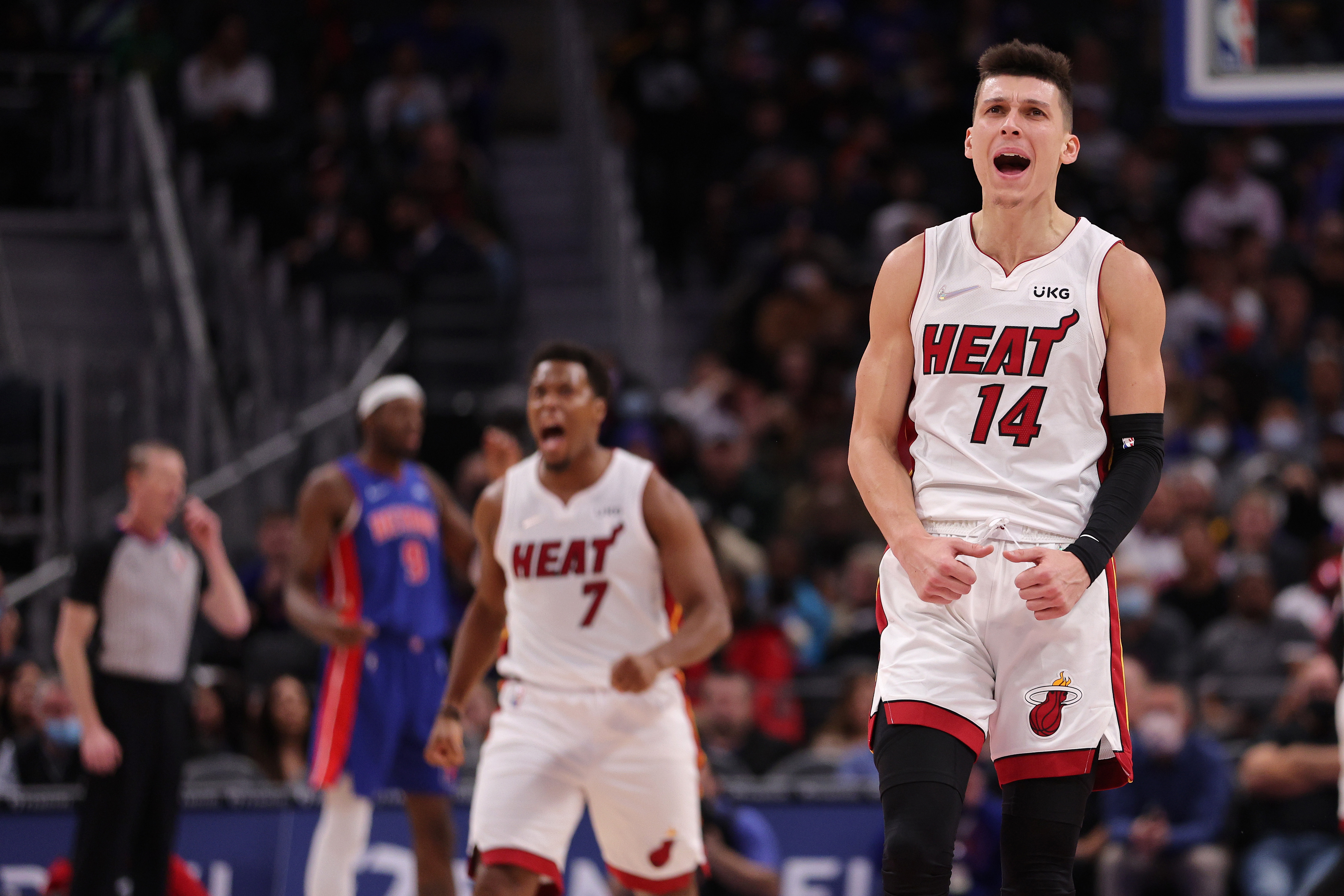 Herro's late run helps Heat come back to beat Pistons