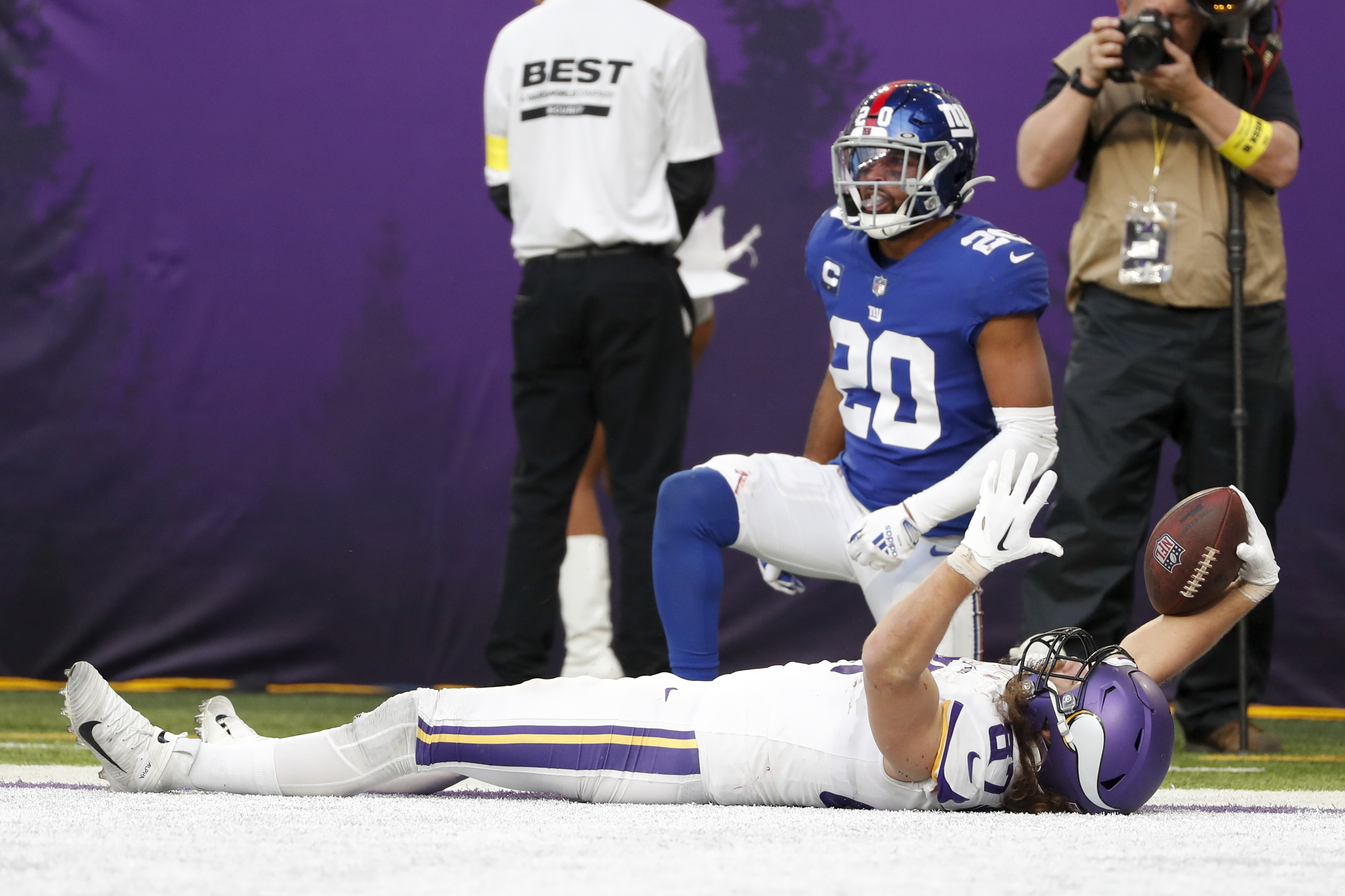 Minnesota Vikings tight end T.J. Hockenson (87) celebrates after catching a  pass during the first half of an NFL wild card playoff football game  against the New York Giants, Sunday, Jan. 15