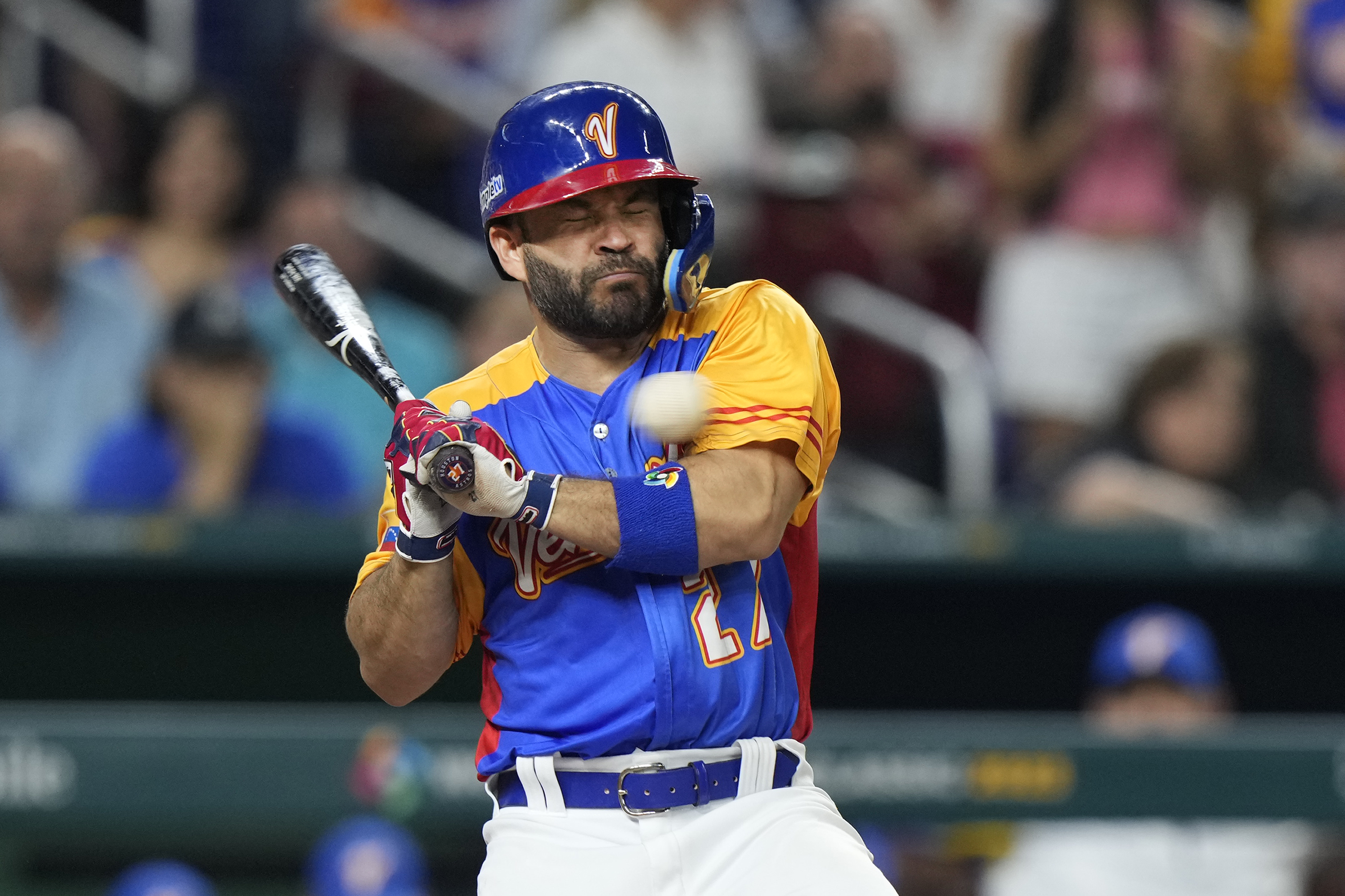Astros' Altuve leaves WBC game after hit on hand by a pitch