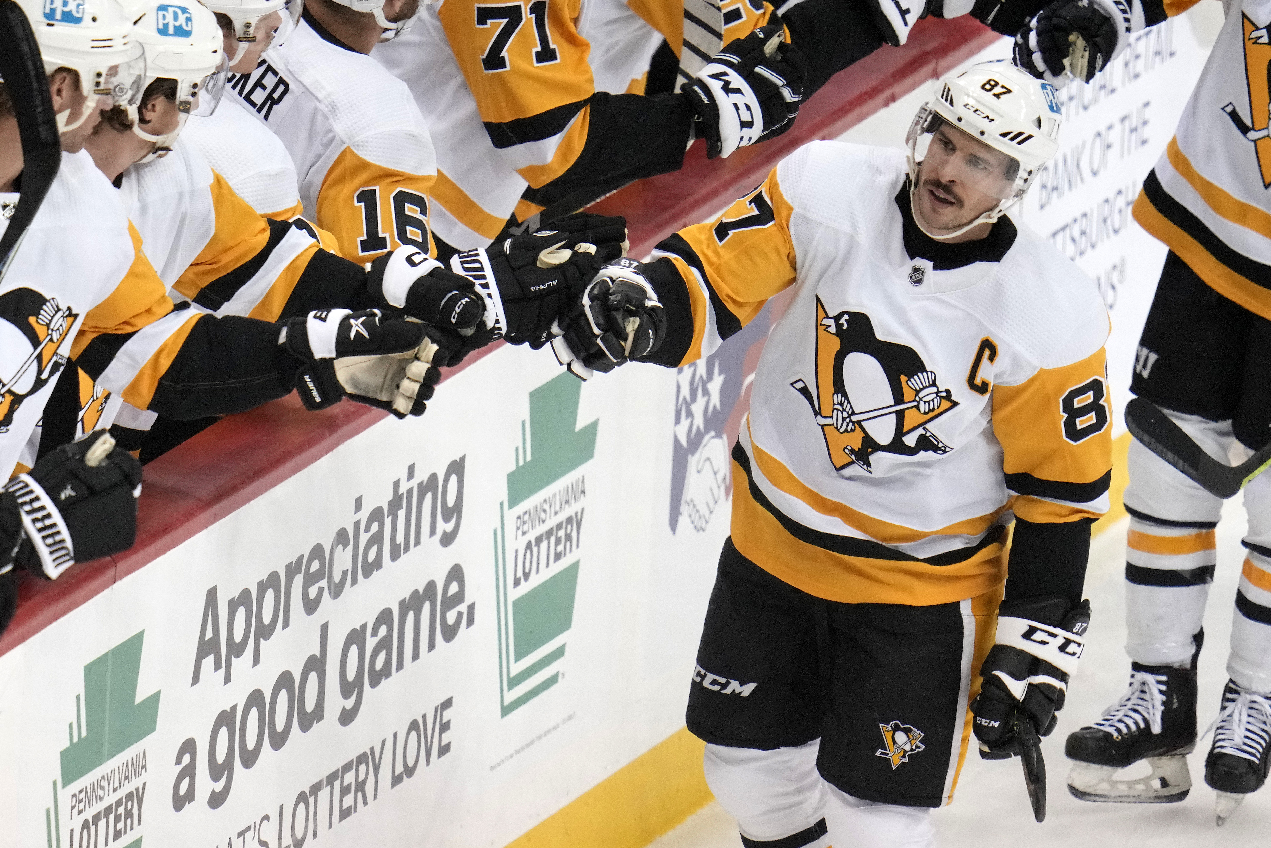 Pittsburgh Penguins' Rickard Rakell (67) celebrates his goal with Jake  Guentzel (59) during the first period of an NHL hockey game against the  Buffalo Sabres in Pittsburgh, Saturday, Dec. 10, 2022. (AP