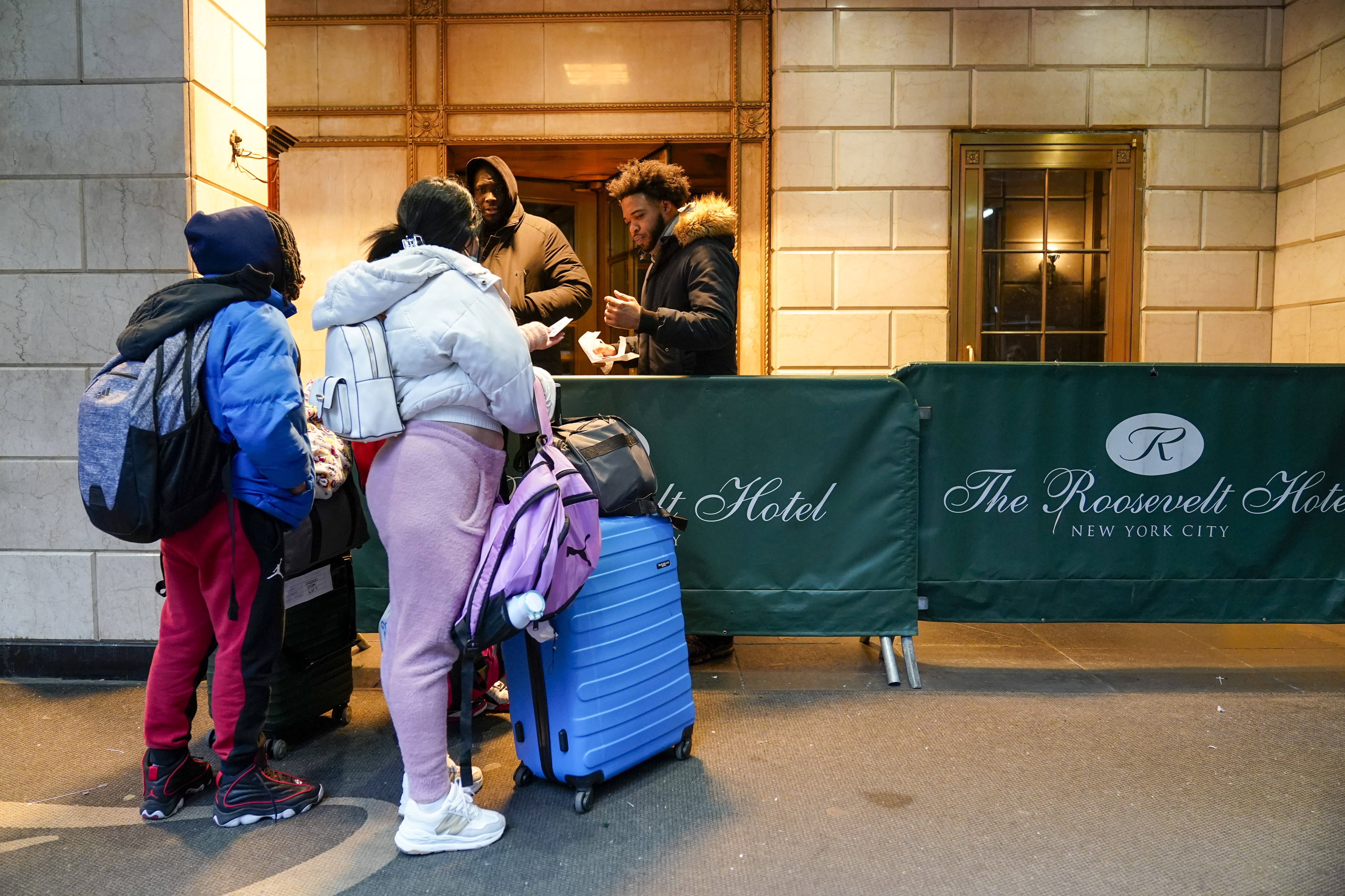 Migrant families begin leaving NYC hotels as first eviction