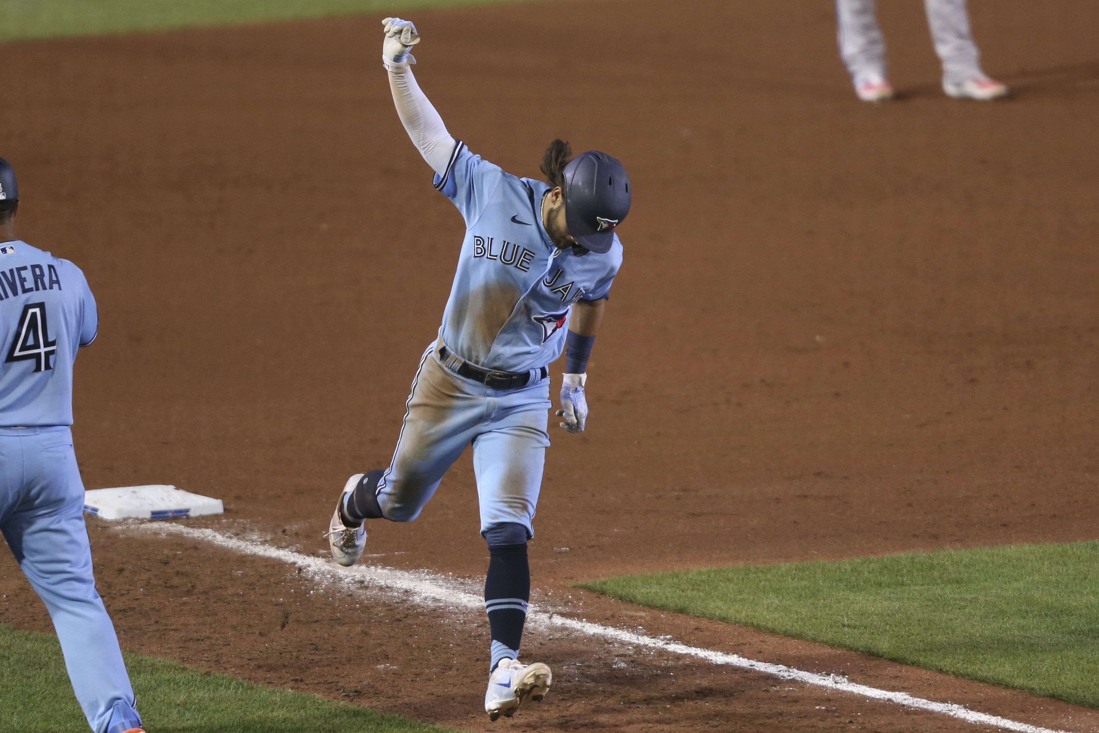 Marlins finally get to go home after beating Blue Jays 14-11