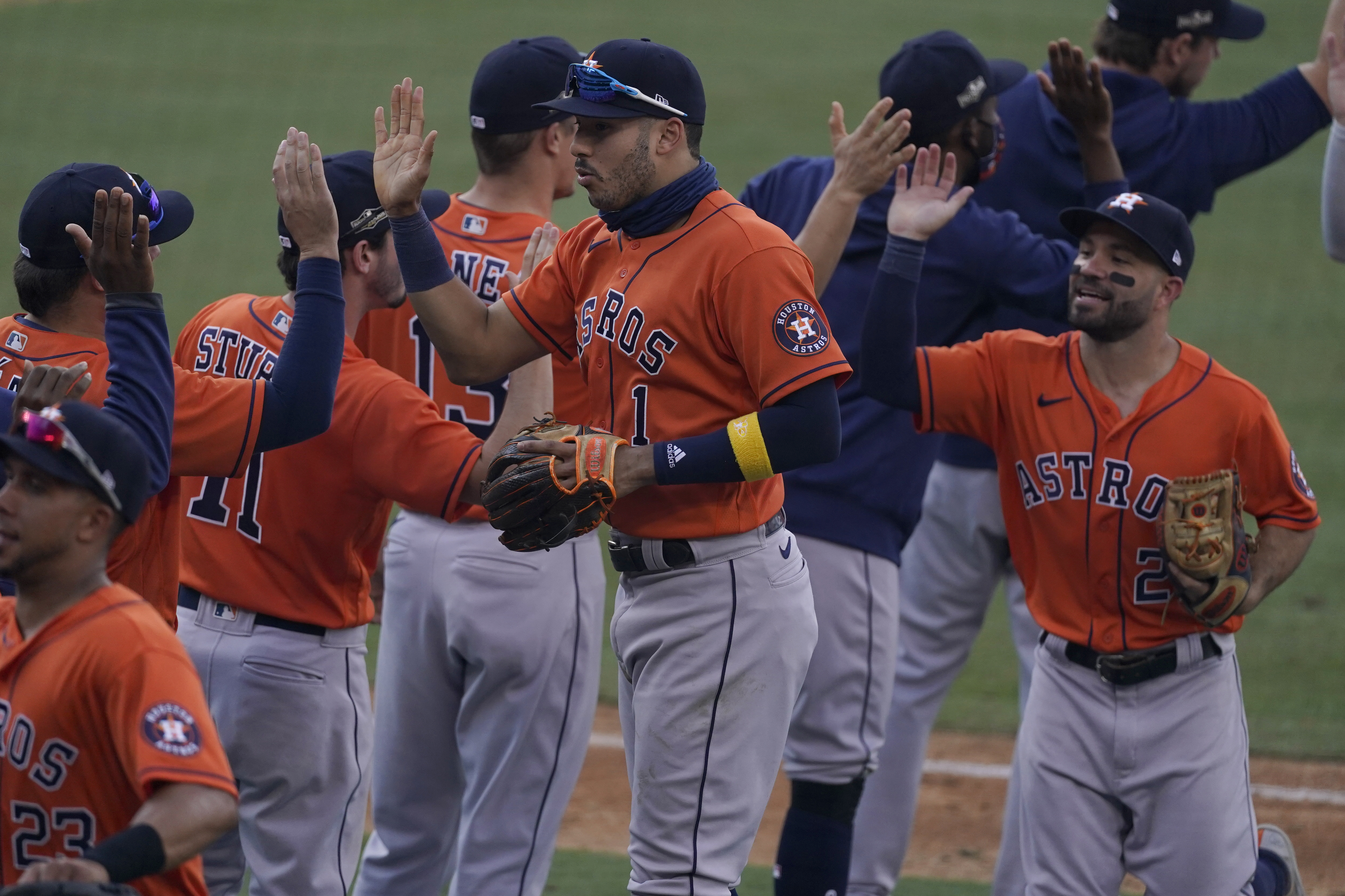 Correa, Springer rally Astros past A's 10-5 in ALDS opener