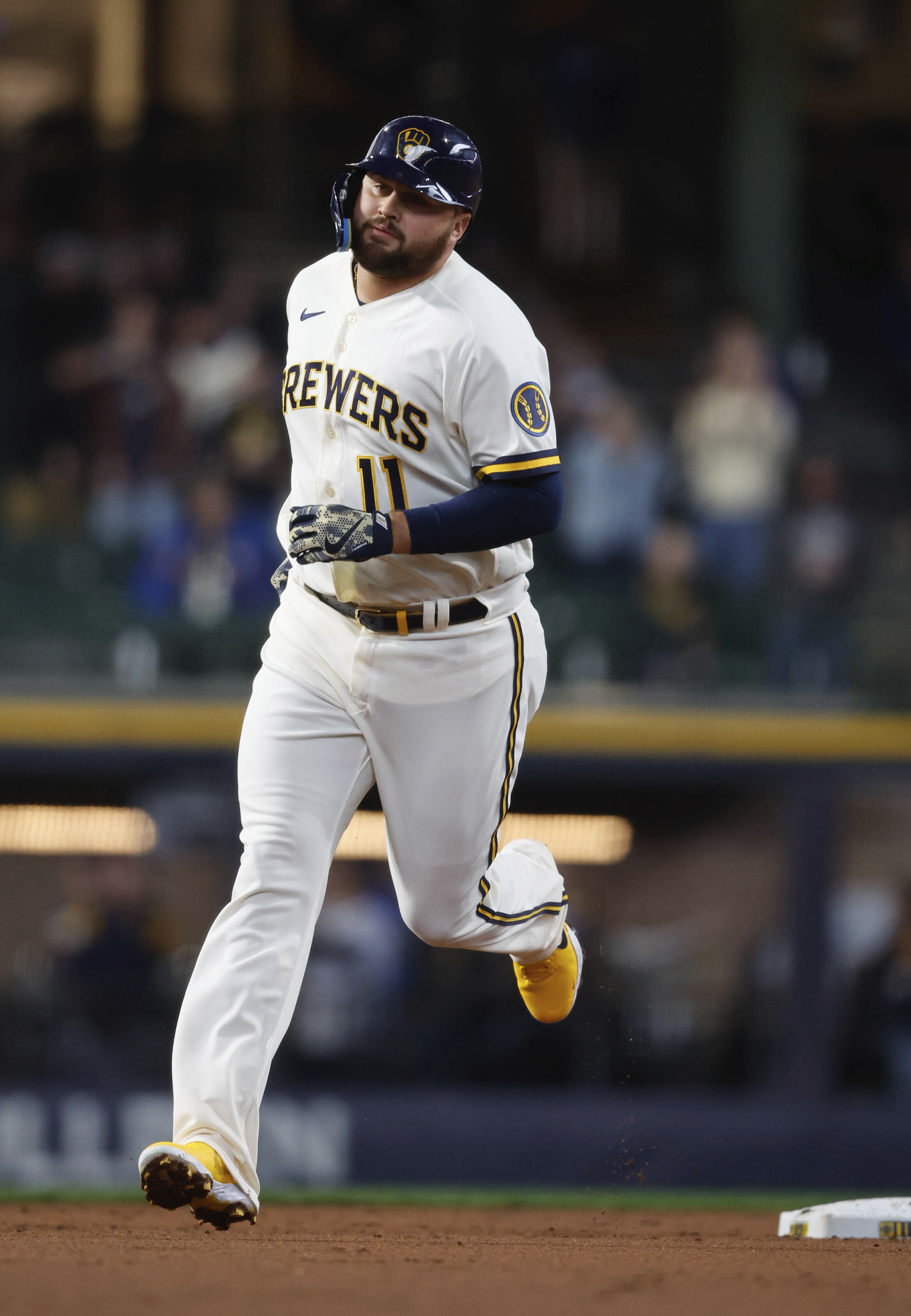 Pittsburgh Pirates left fielder Bryan Reynolds (10) flips his bat after  striking out against the Milwaukee Brewers during the sixth inning of a  baseball game Wednesday, April 20, 2022, in Milwaukee. (AP